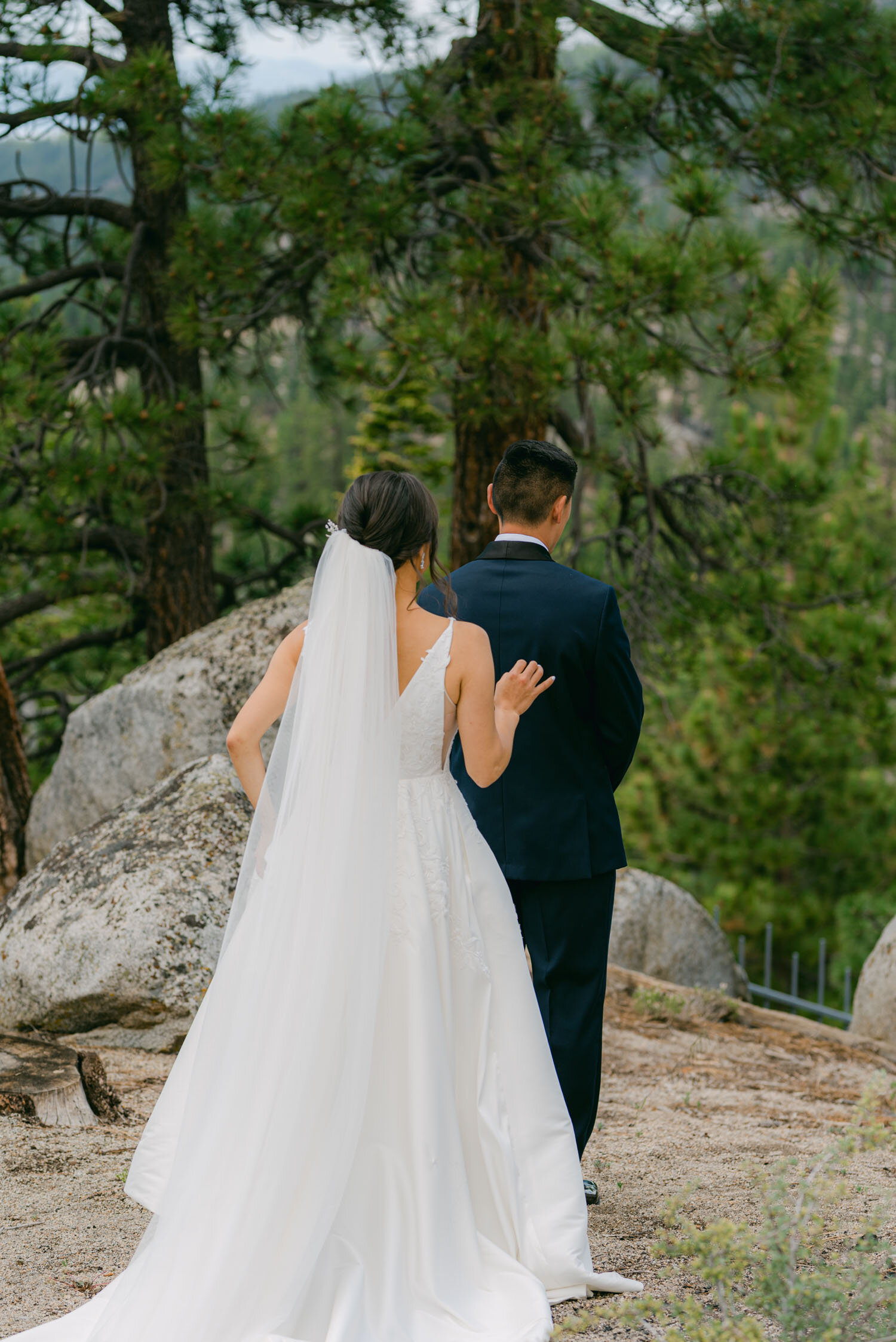 Tahoe Blue Estate Wedding photo of groom's back during the first look