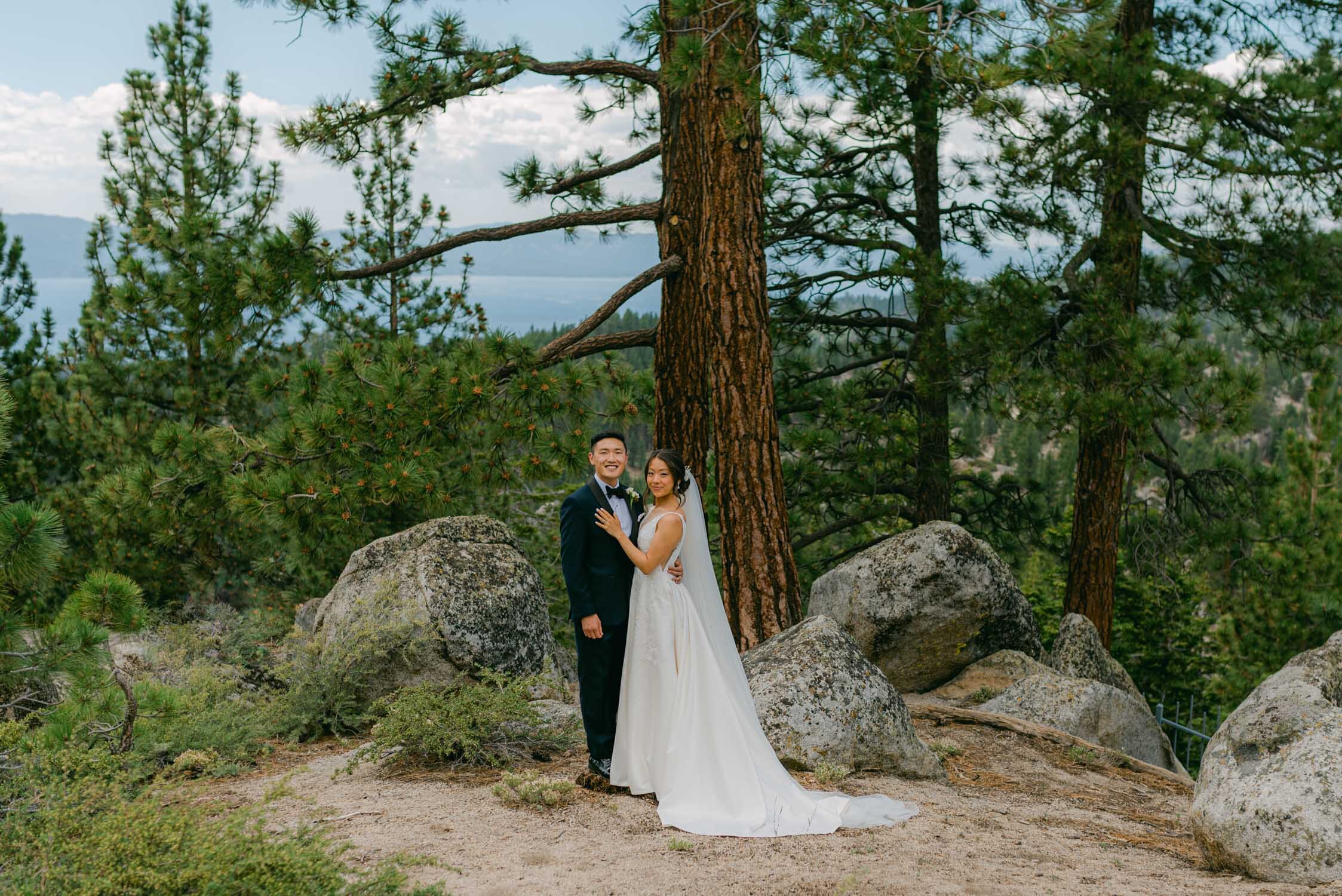 Tahoe Blue Estate Wedding photo of couple with lake tahoe in the backdrop