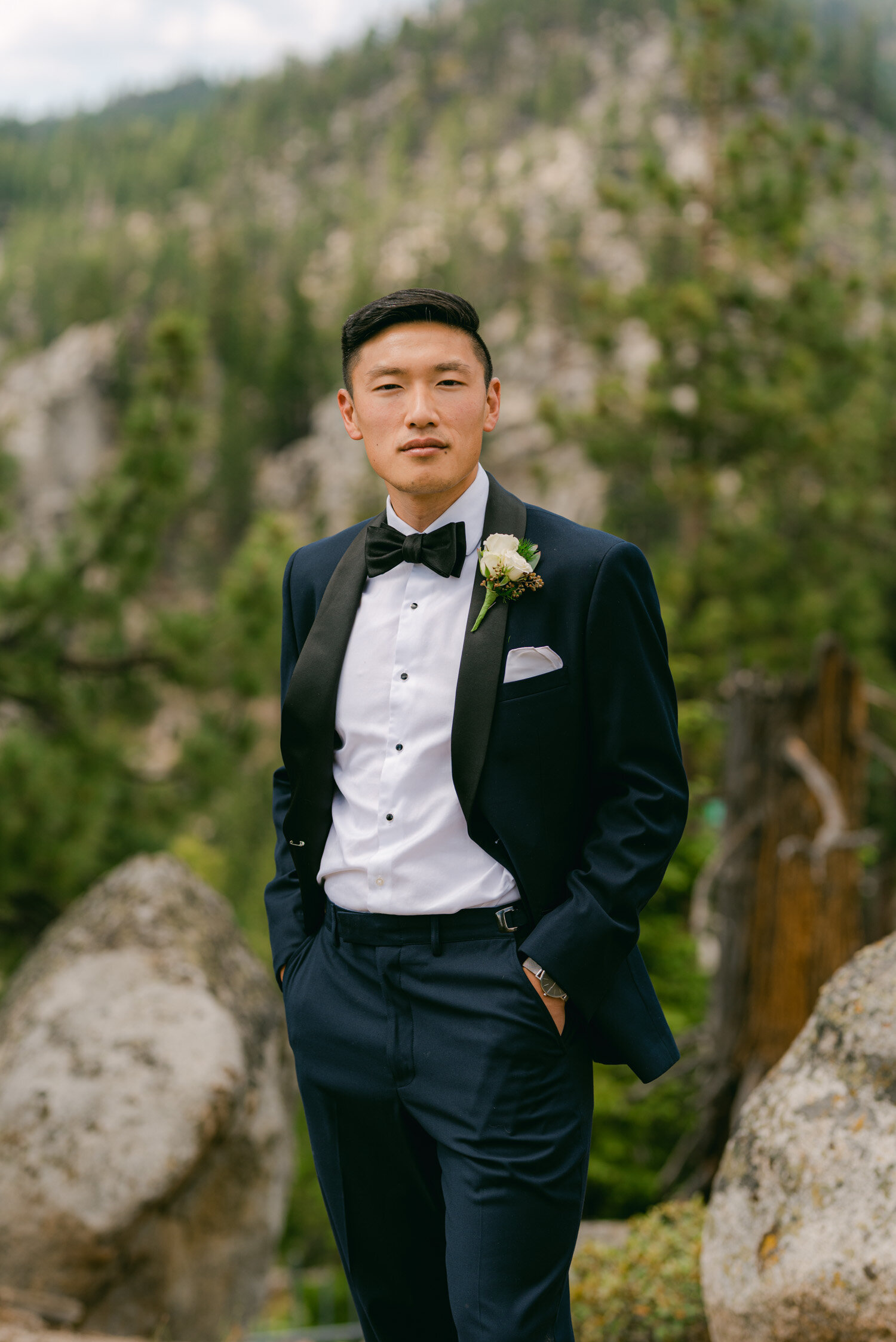 Tahoe Blue Estate Wedding photo of groom with the forest in the background