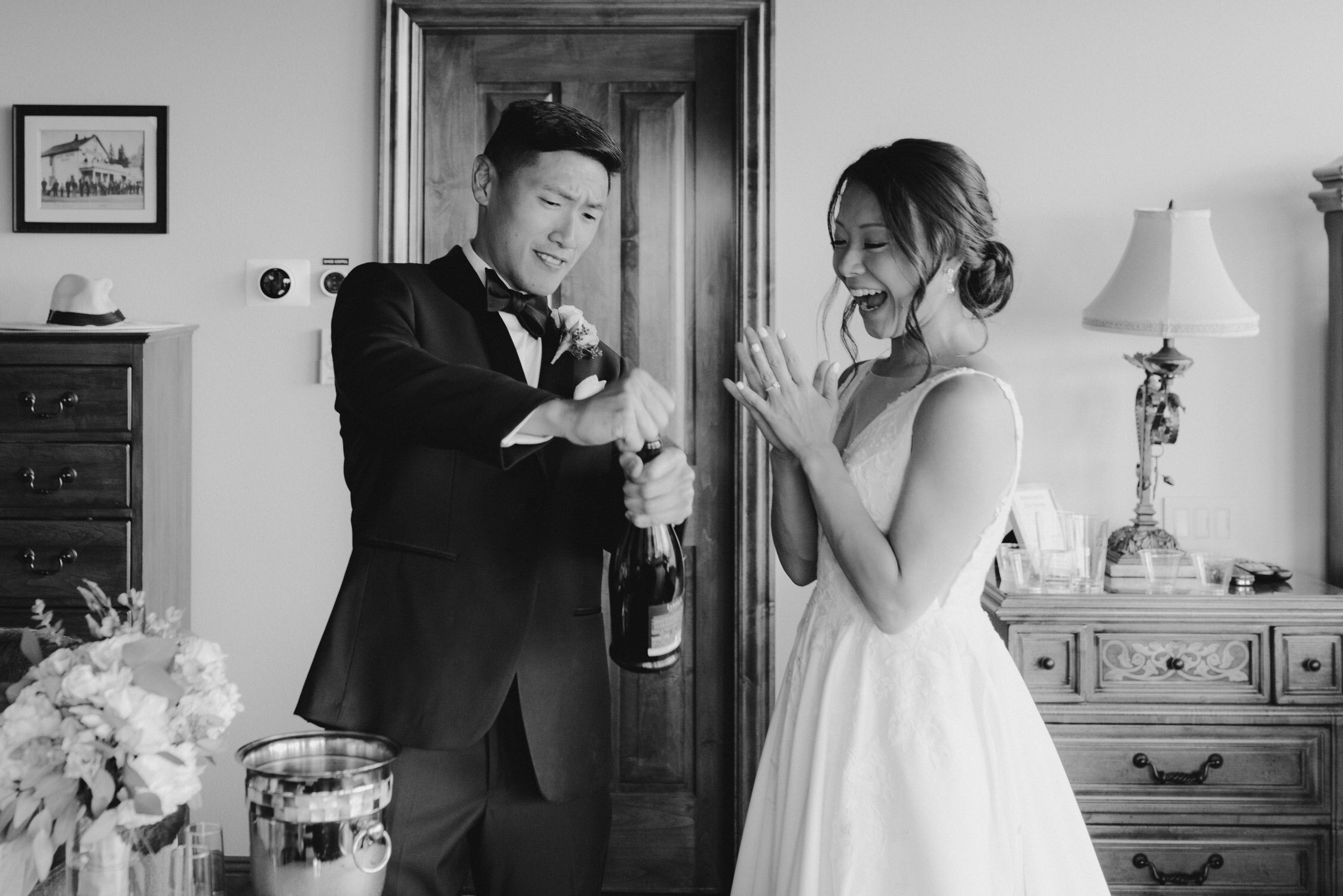 Tahoe Blue Estate Wedding photo of wedding couple enjoying champagne before the ceremony