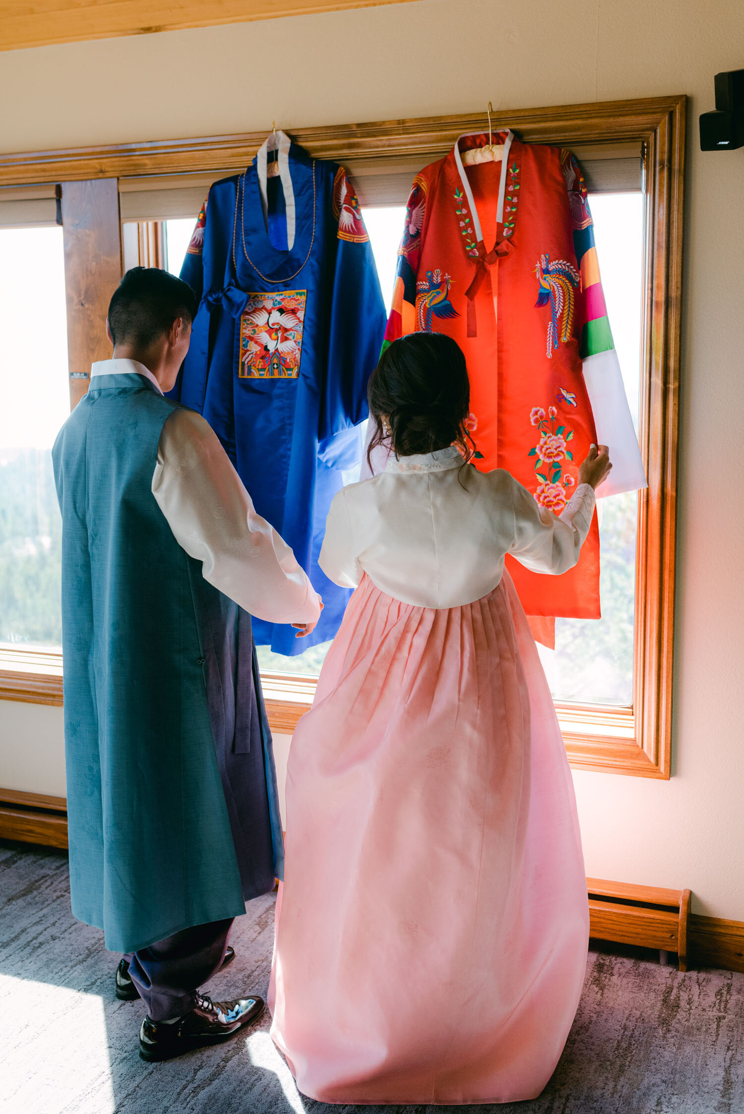 Tahoe Blue Estate Wedding, photo of the wedding couple getting ready for the Korean and Chinese ceremony 