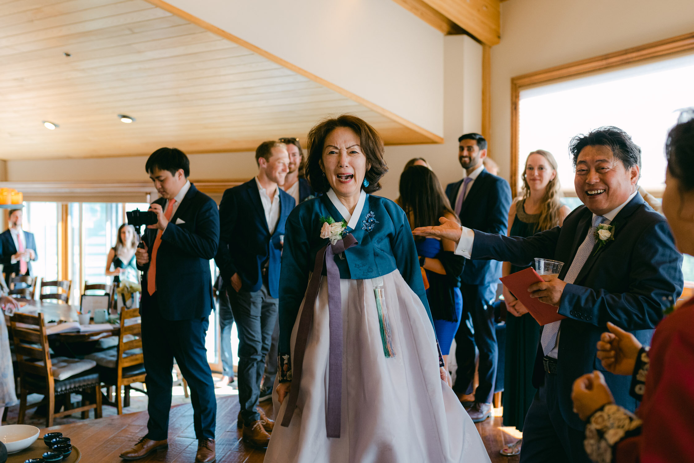 Tahoe Blue Estate Wedding, photo of grooms mom during the Korean and Chinese wedding ceremony