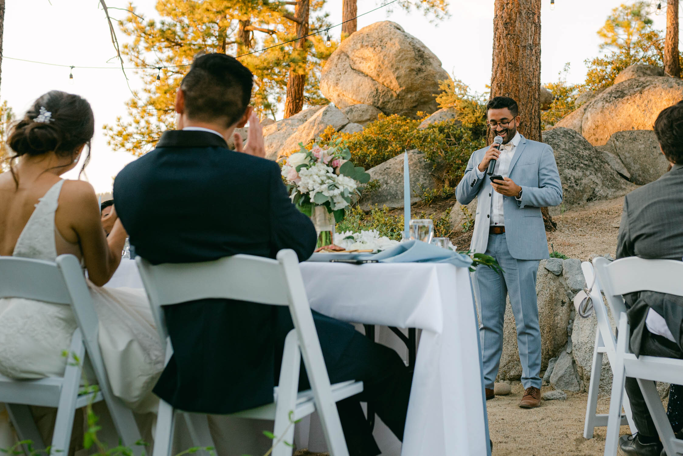 Tahoe Blue estate wedding photography, photo of the officiant giving a toast