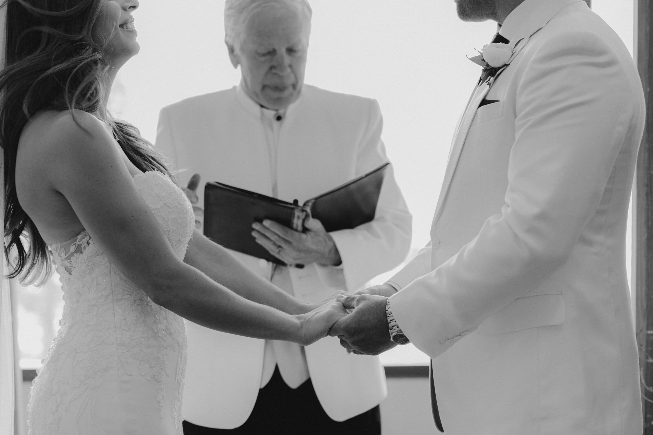 Palisades wedding, photo of couple holding hands during the ceremony