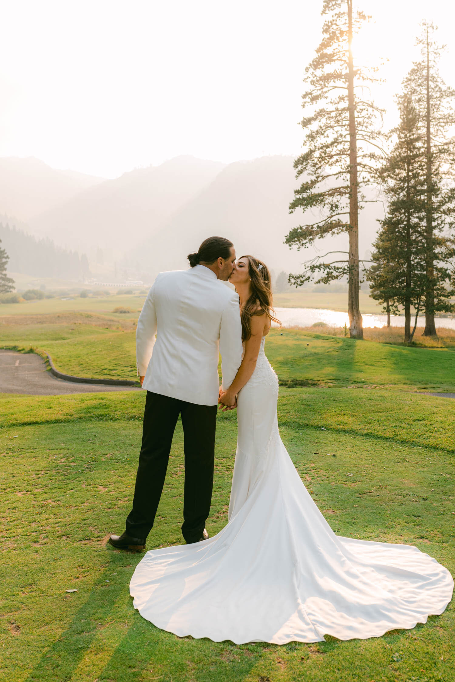 Palisades wedding, photo of couple standing on the golf course of what was formerly Squaw Valley 