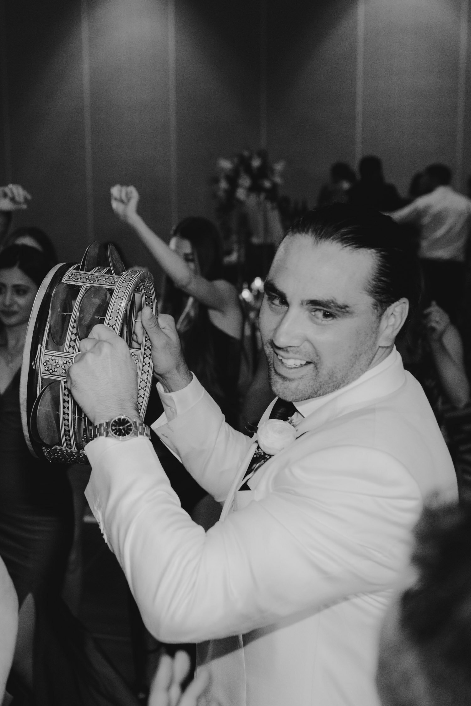 Palisades wedding, photo of groom playing the drums with the drummers