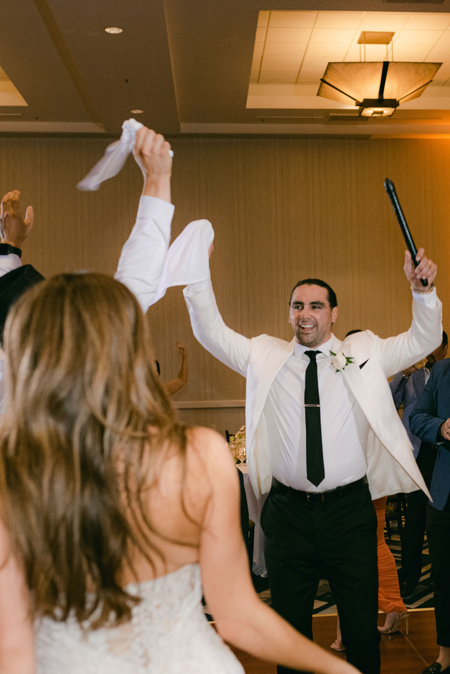 Palisades wedding, photo of groom dancing with the arab drummers
