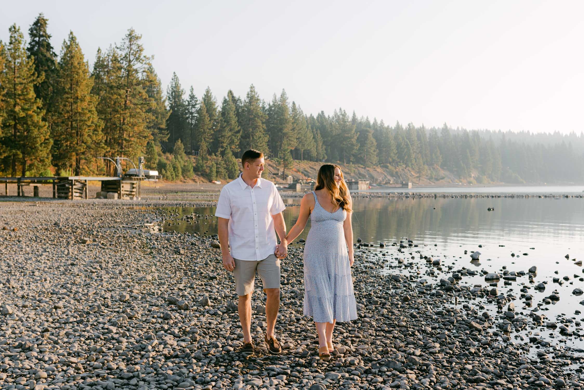 Lake Tahoe Maternity Session, photo of couple walking by the lake