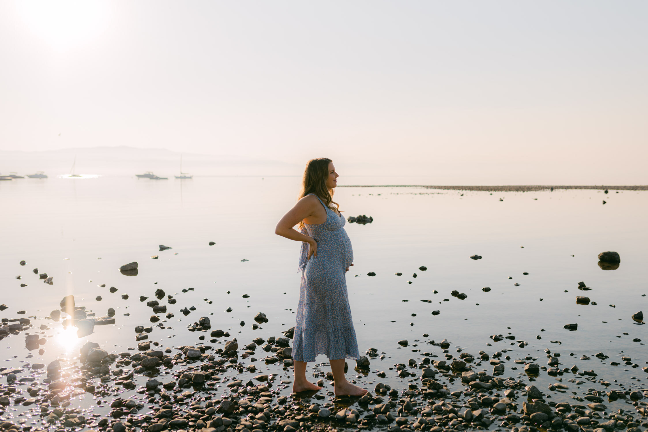 Lake Tahoe Maternity Session, photo of mom-to-be during the sunrise glow