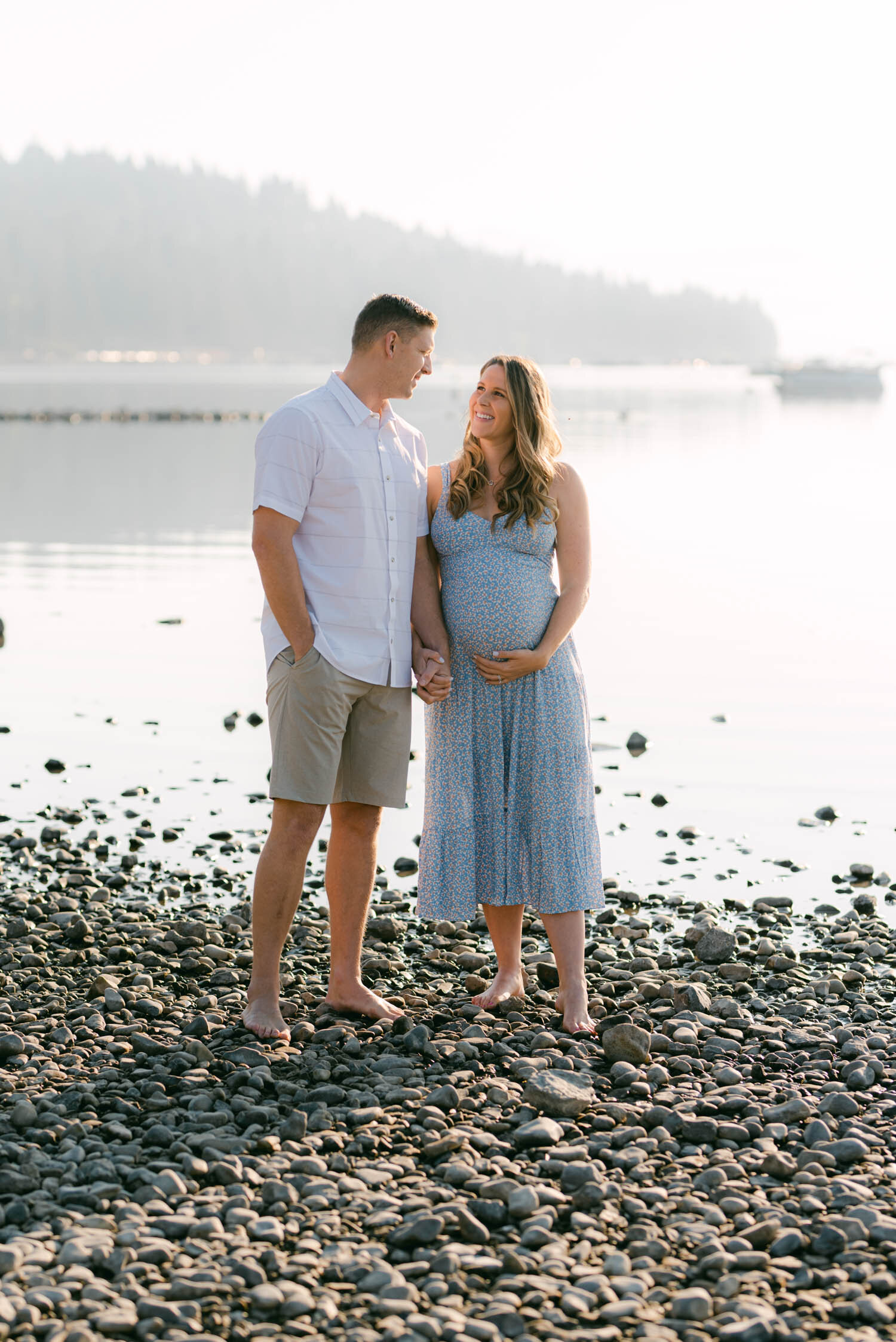 Lake Tahoe Maternity Session, photo of mom-to-be and her husband near the shoreline of Tahoe 