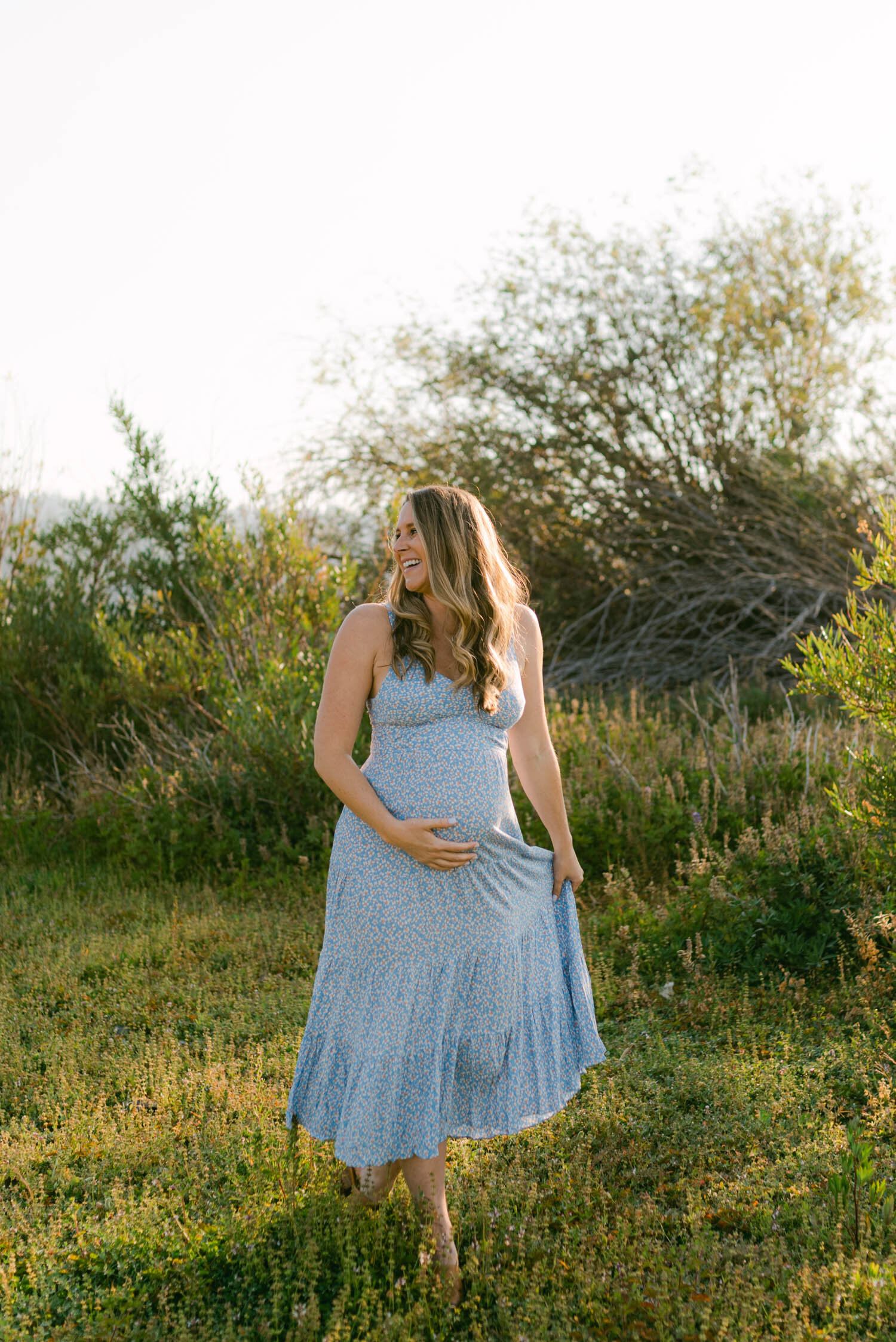 Lake Tahoe Maternity Session, photo of mom-to-be walking in the meadow