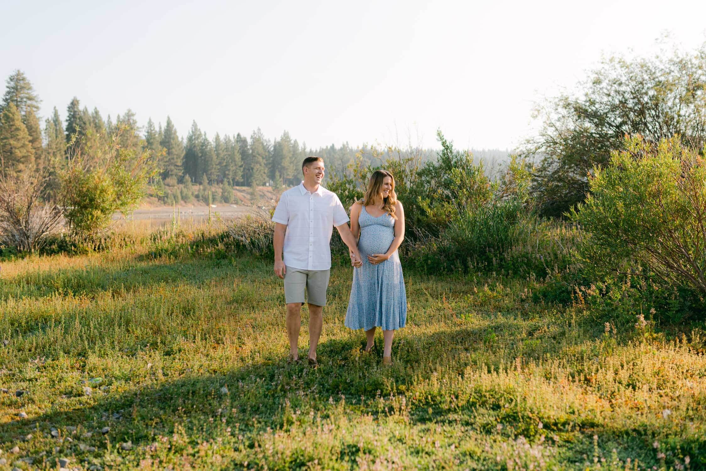 Lake Tahoe Maternity Session, photo of couple walking in the meadow