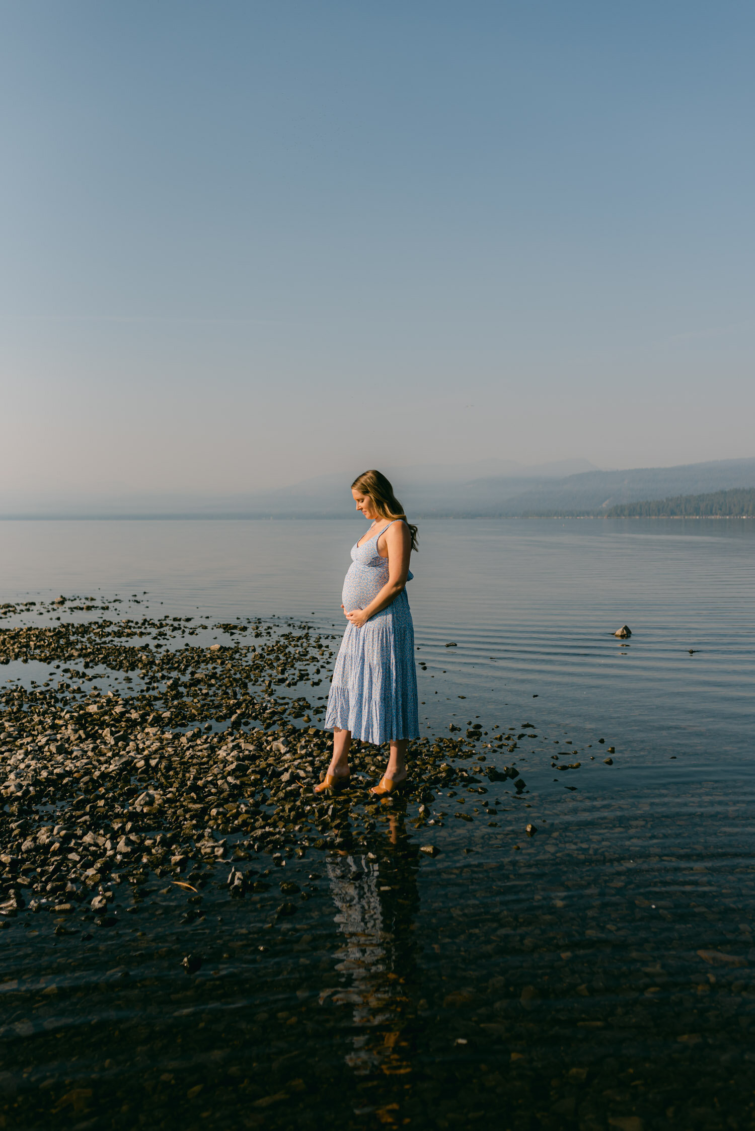 Lake Tahoe Maternity Session, photo of mom-to-be with lake tahoe in the background