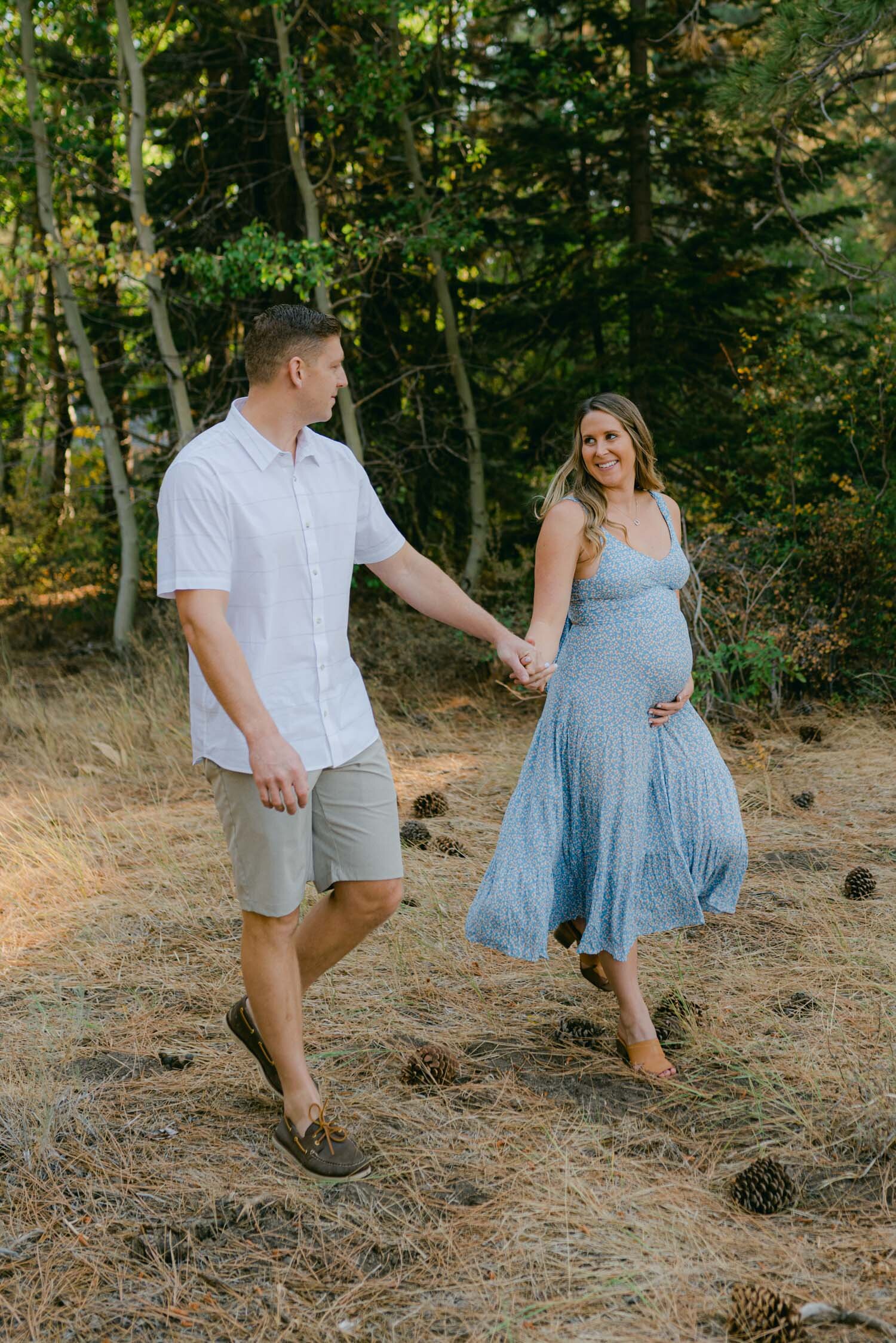 Lake Tahoe Maternity Session, photo of couple walking in the forest