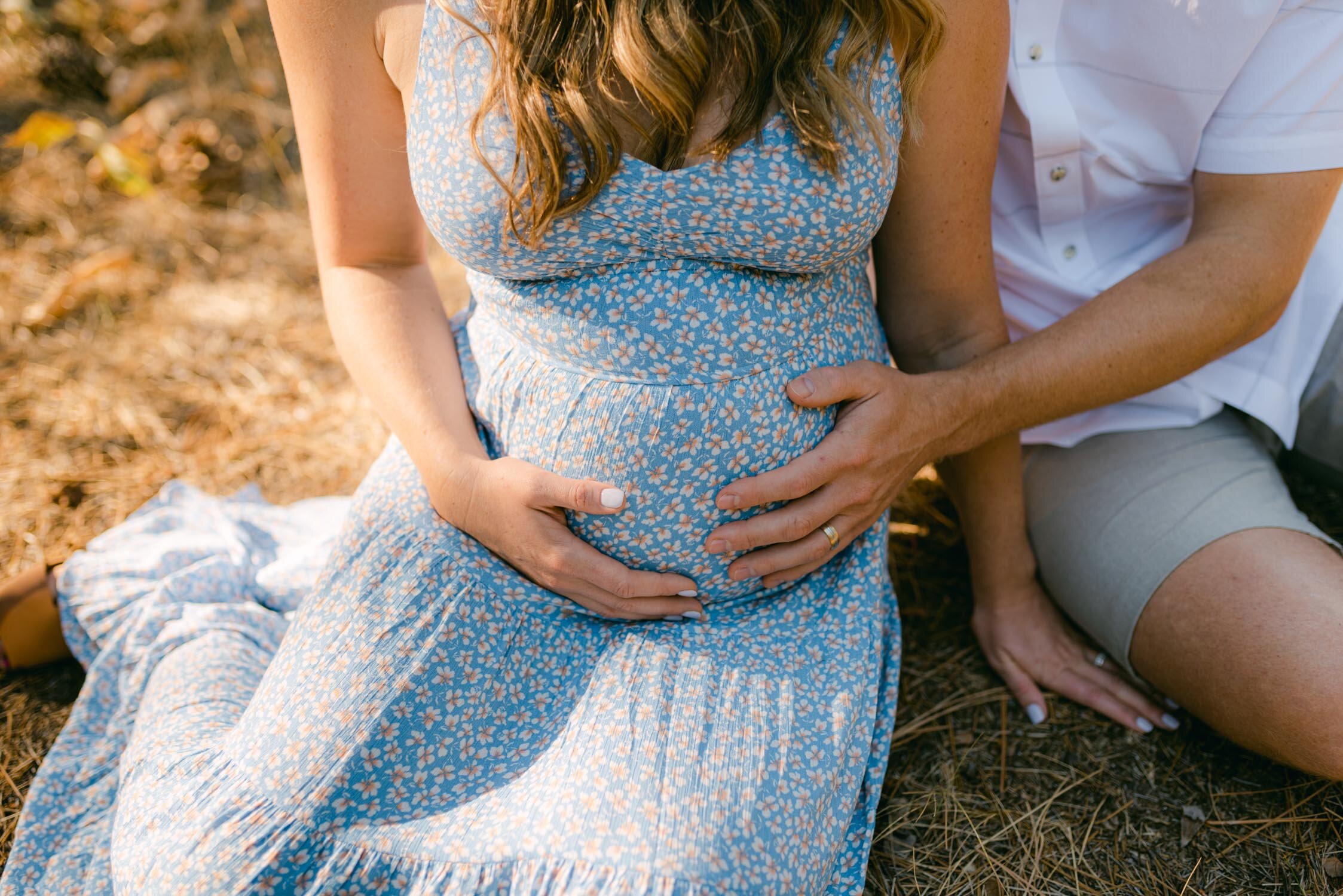 Lake Tahoe Maternity Session, photo of mom-to-be holding her belly