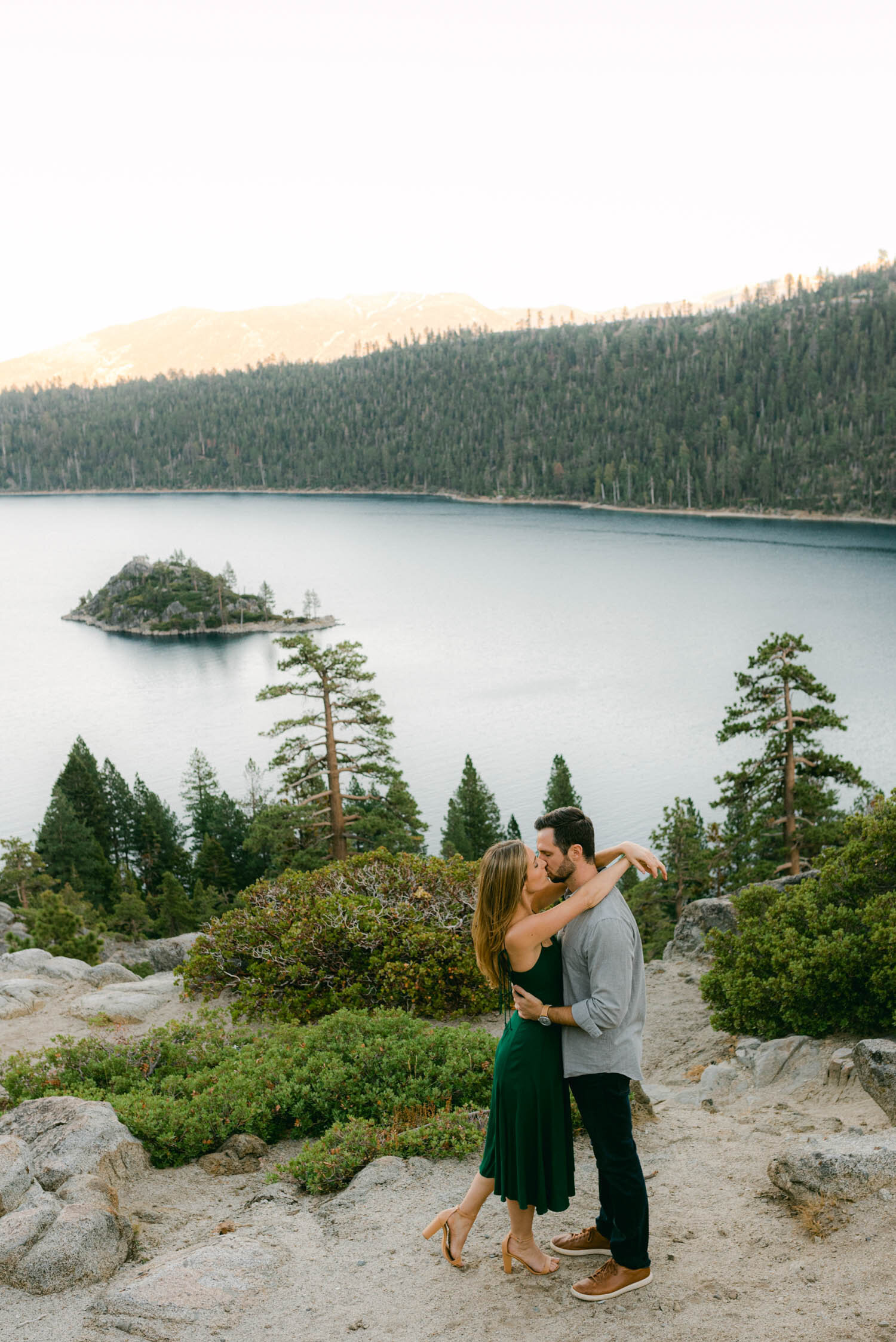 Emerald Bay engagement photoshoot, photo of a couple during sunset at emerald bay