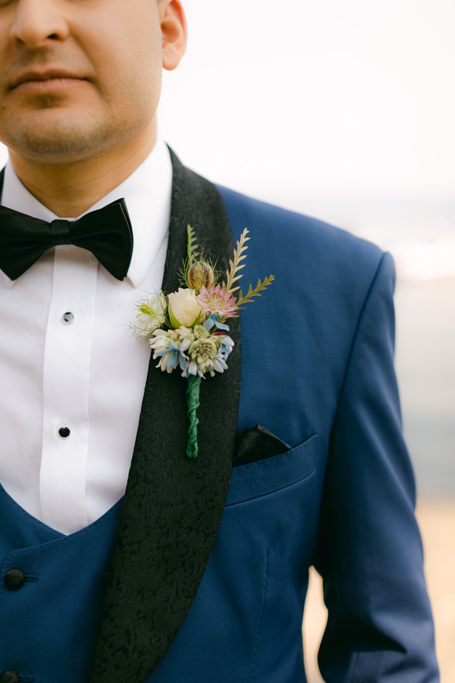 Sunnyside Tahoe Wedding, photo of boutonnière with a rose 