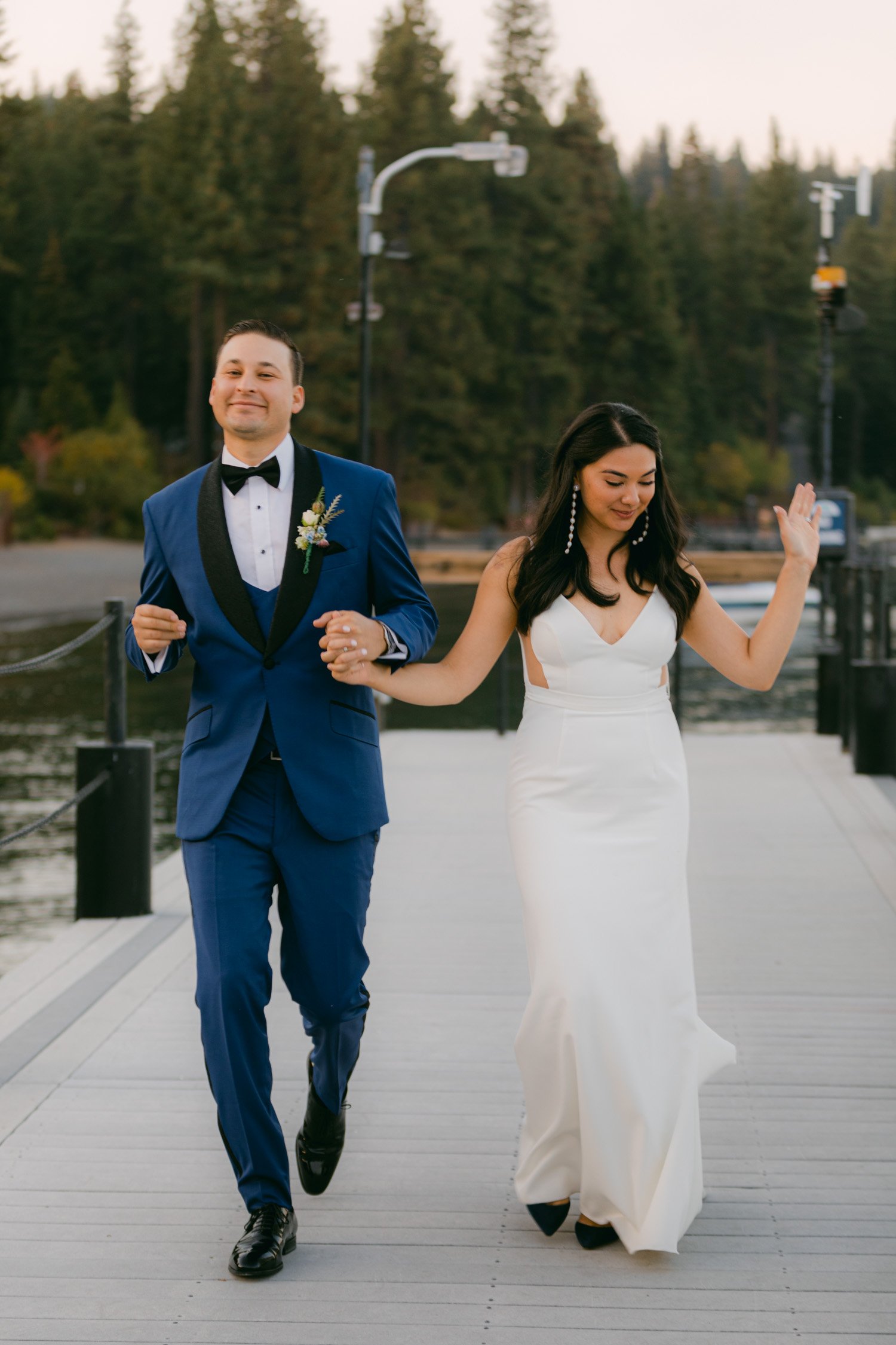 Sunnyside Tahoe Wedding, photo of couple dancing on the dock