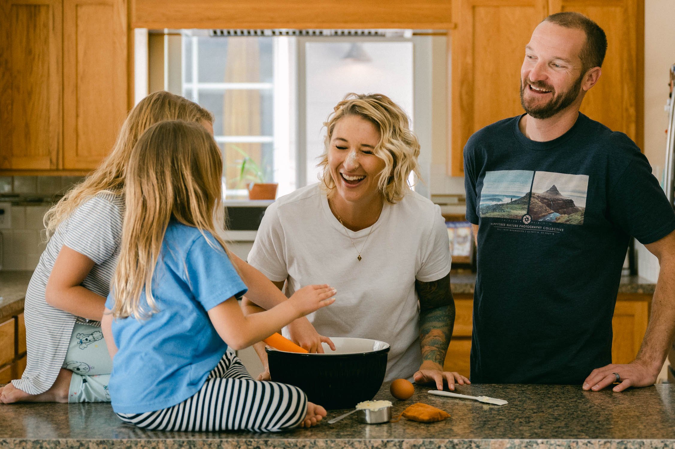 move-in photoshoot, photo of family making cookies 
