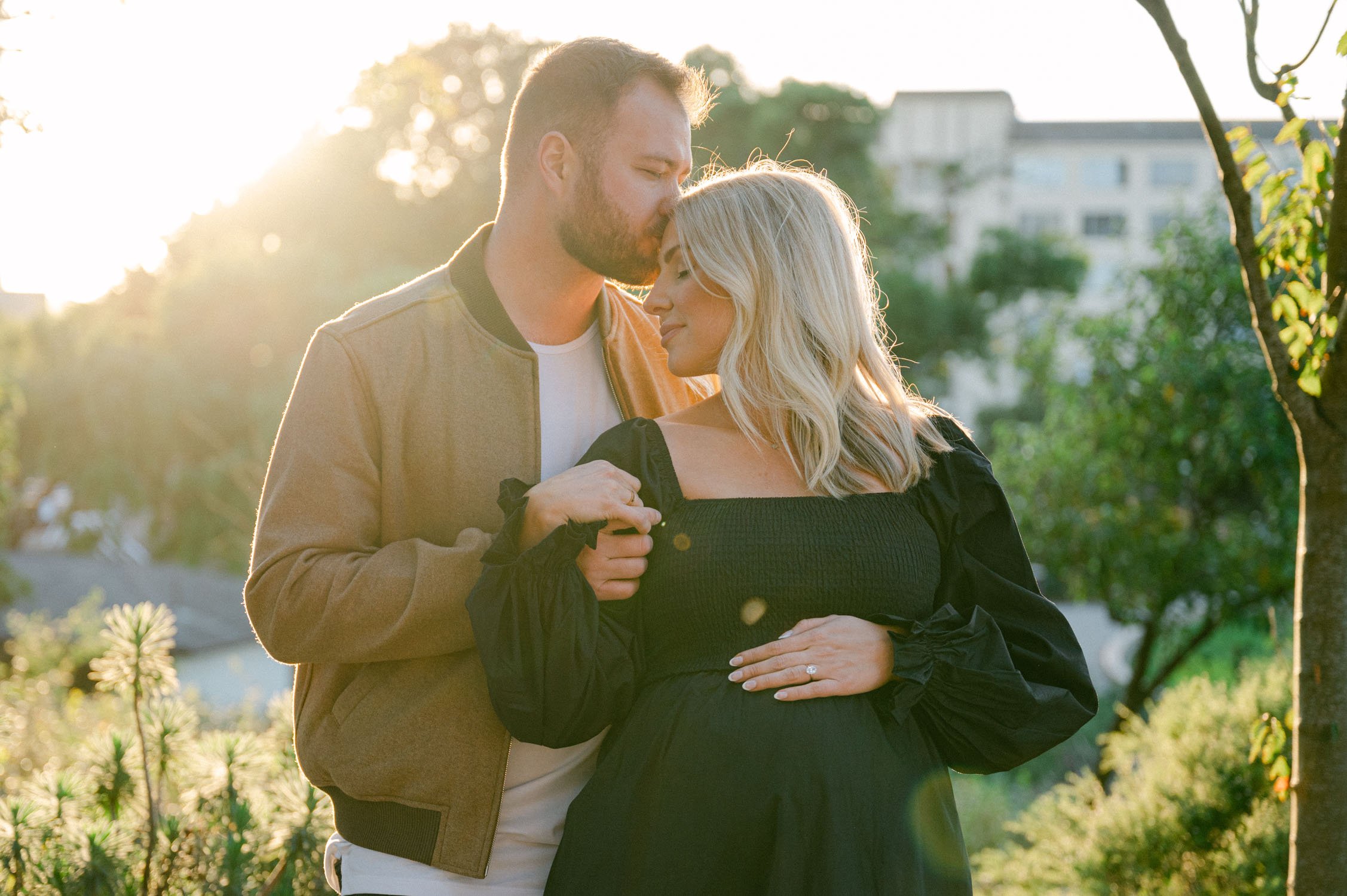 An urban san francisco maternity session, photo of couple during golden hour