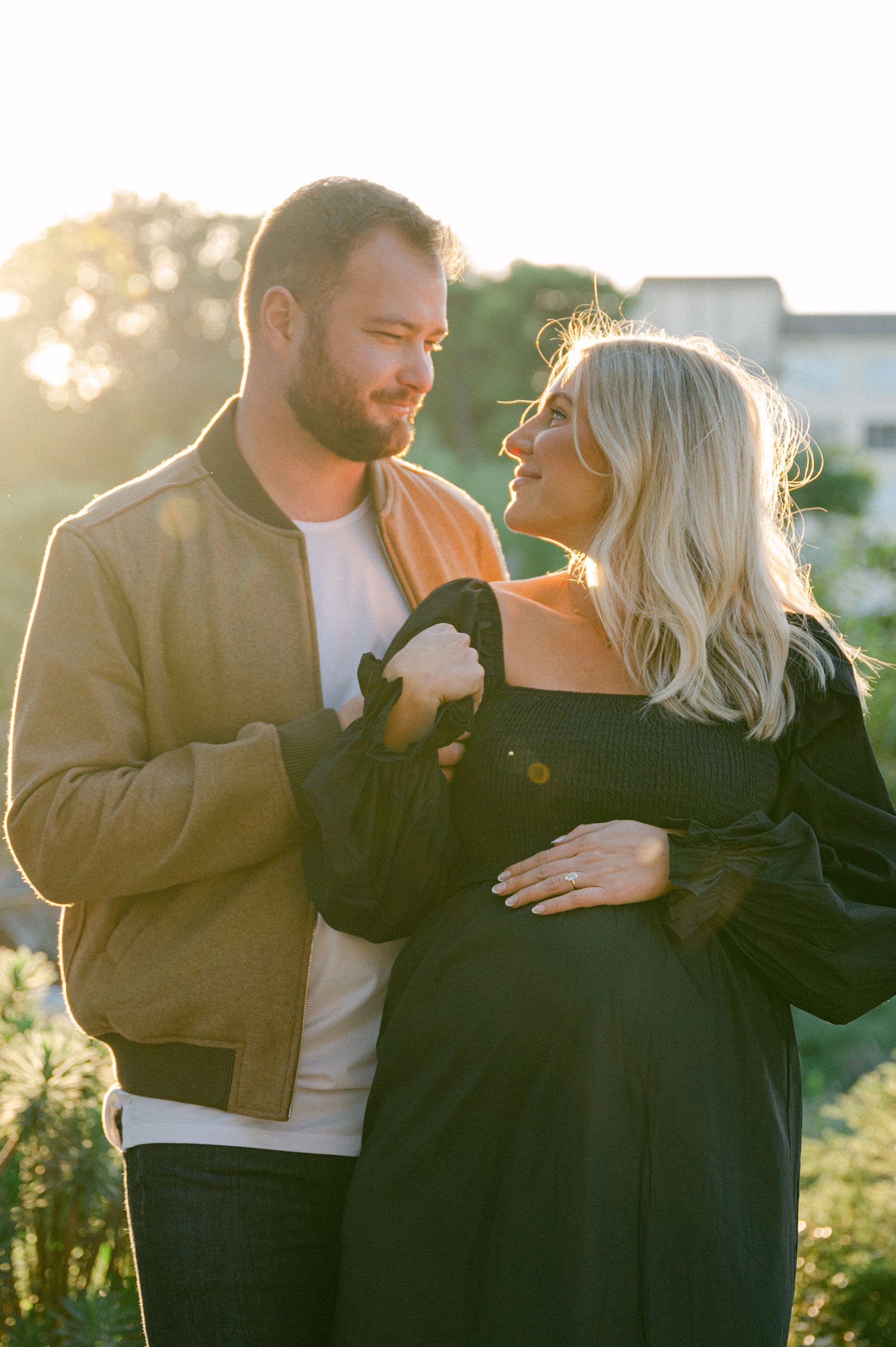 An urban san francisco maternity session, photo of couple during golden hour
