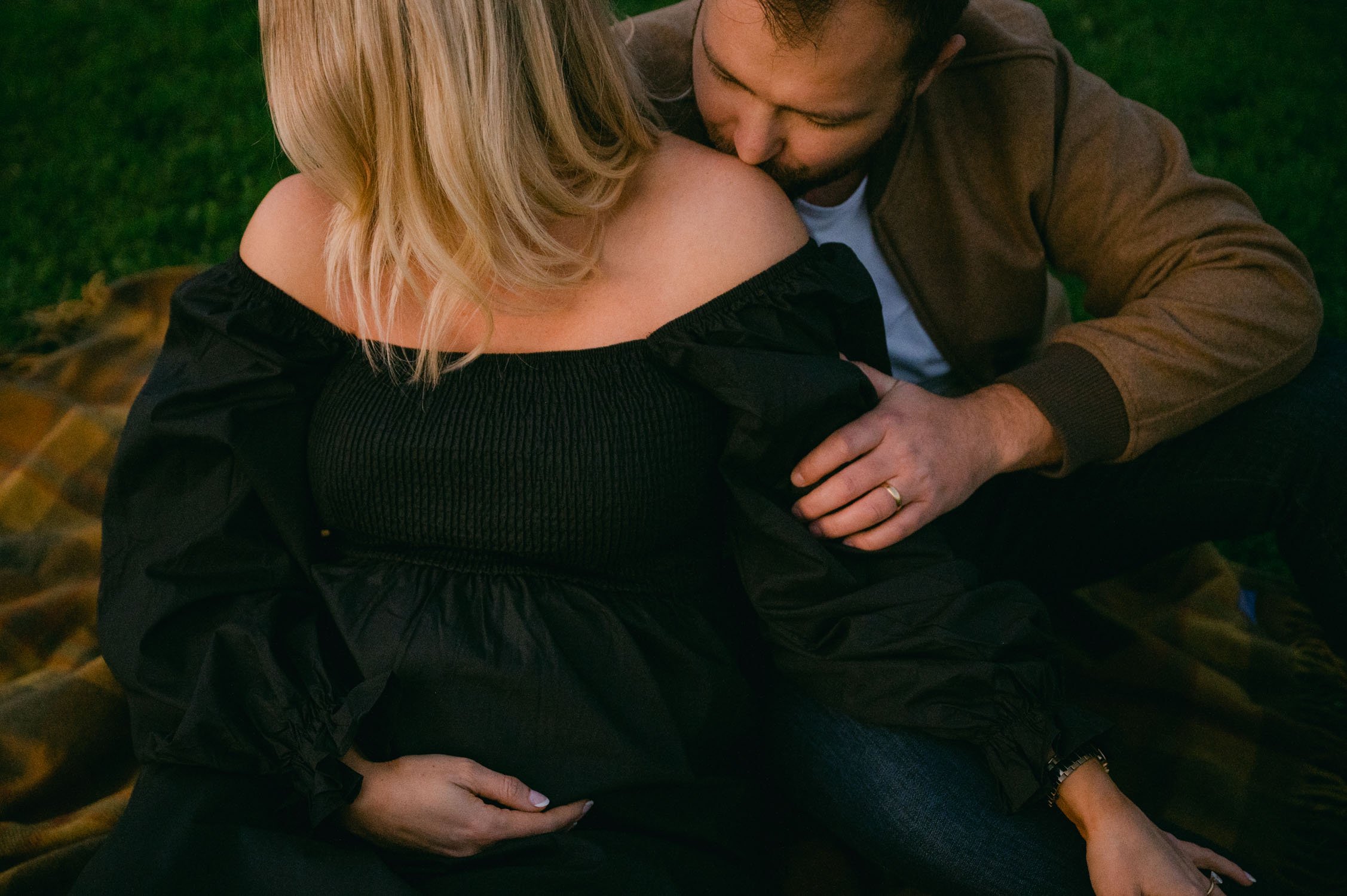  An urban san francisco maternity session, candid photo of couple during twilight hour