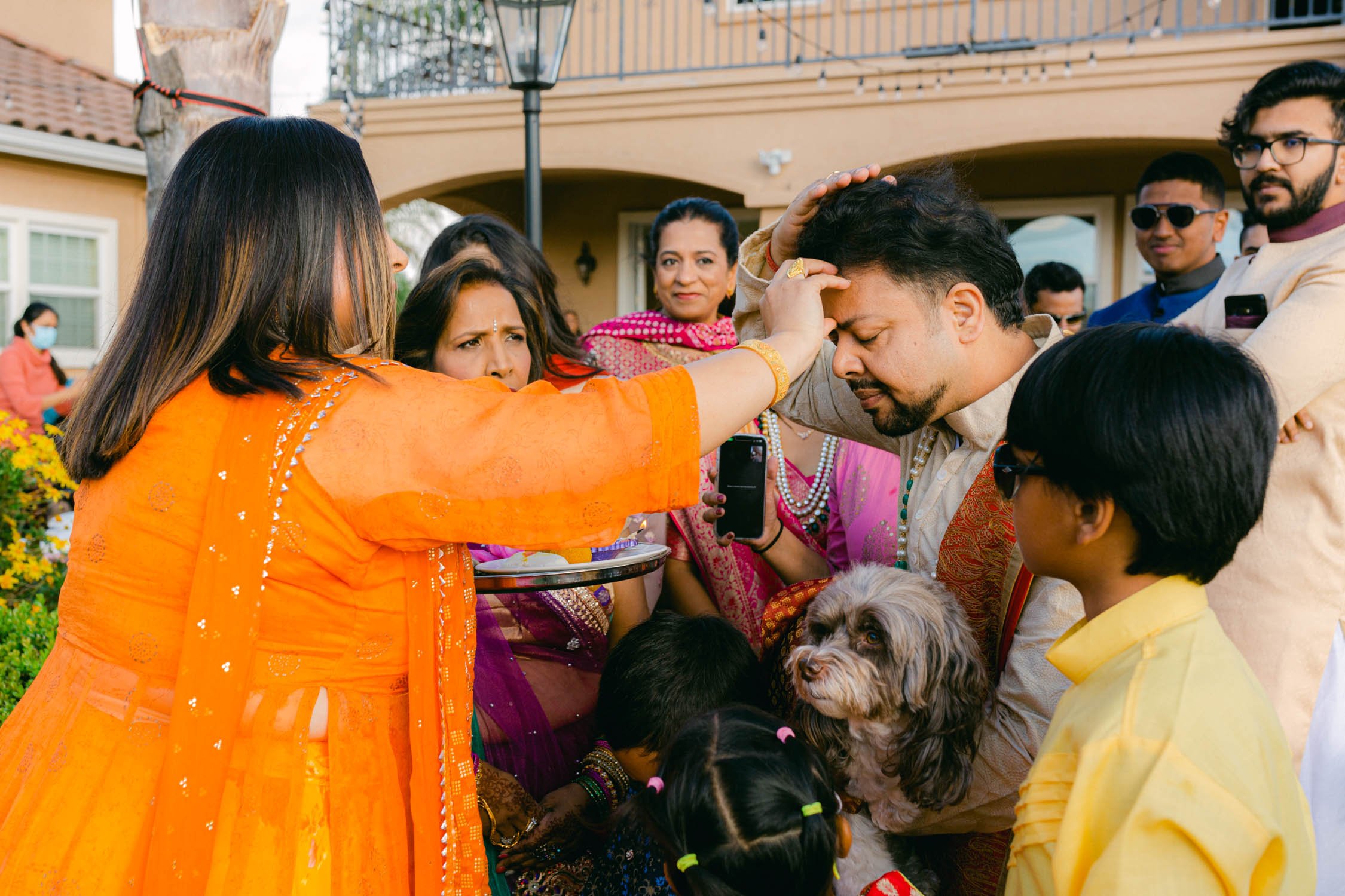 Hindu ceremony, photo of groom getting henna done 