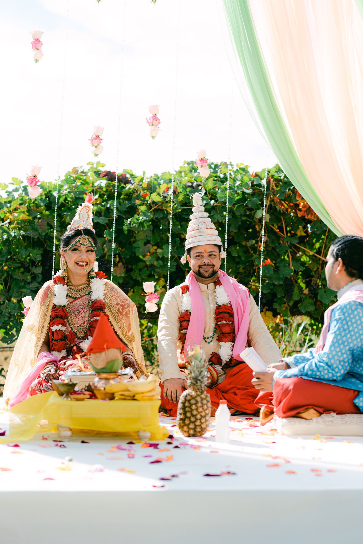 Hindu wedding ceremony at american canyon , photo of couple sitting down on stage