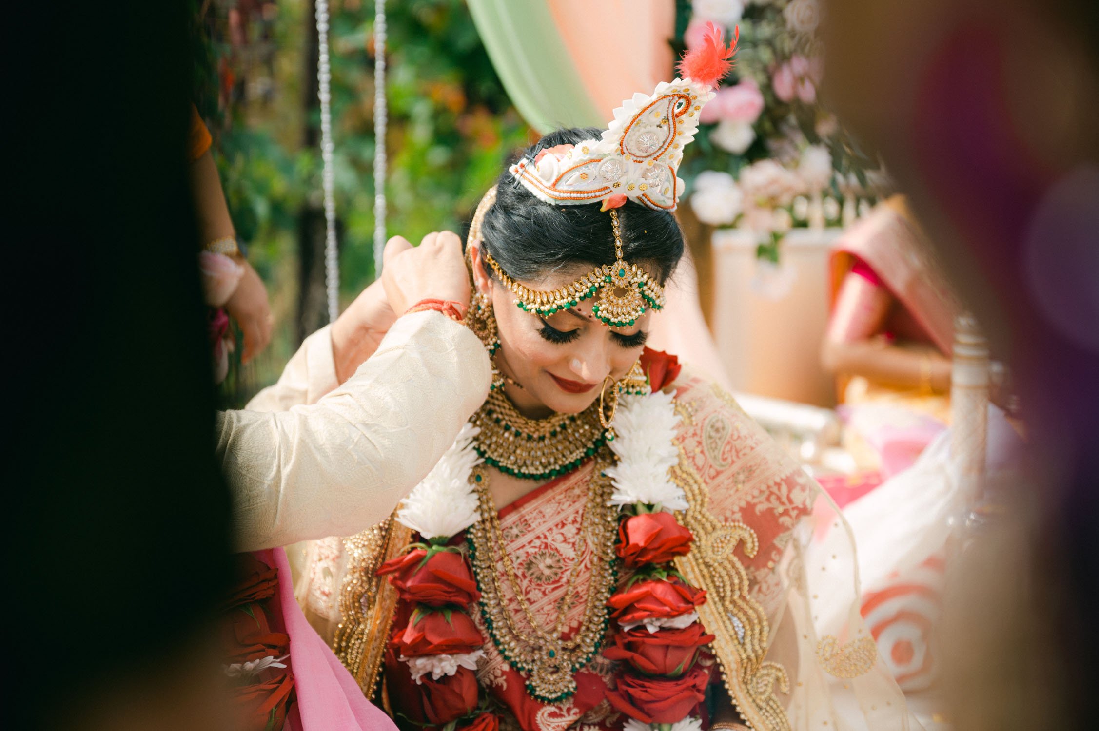 Hindu wedding ceremony at american canyon , photo of groom gifting bride a necklace 
