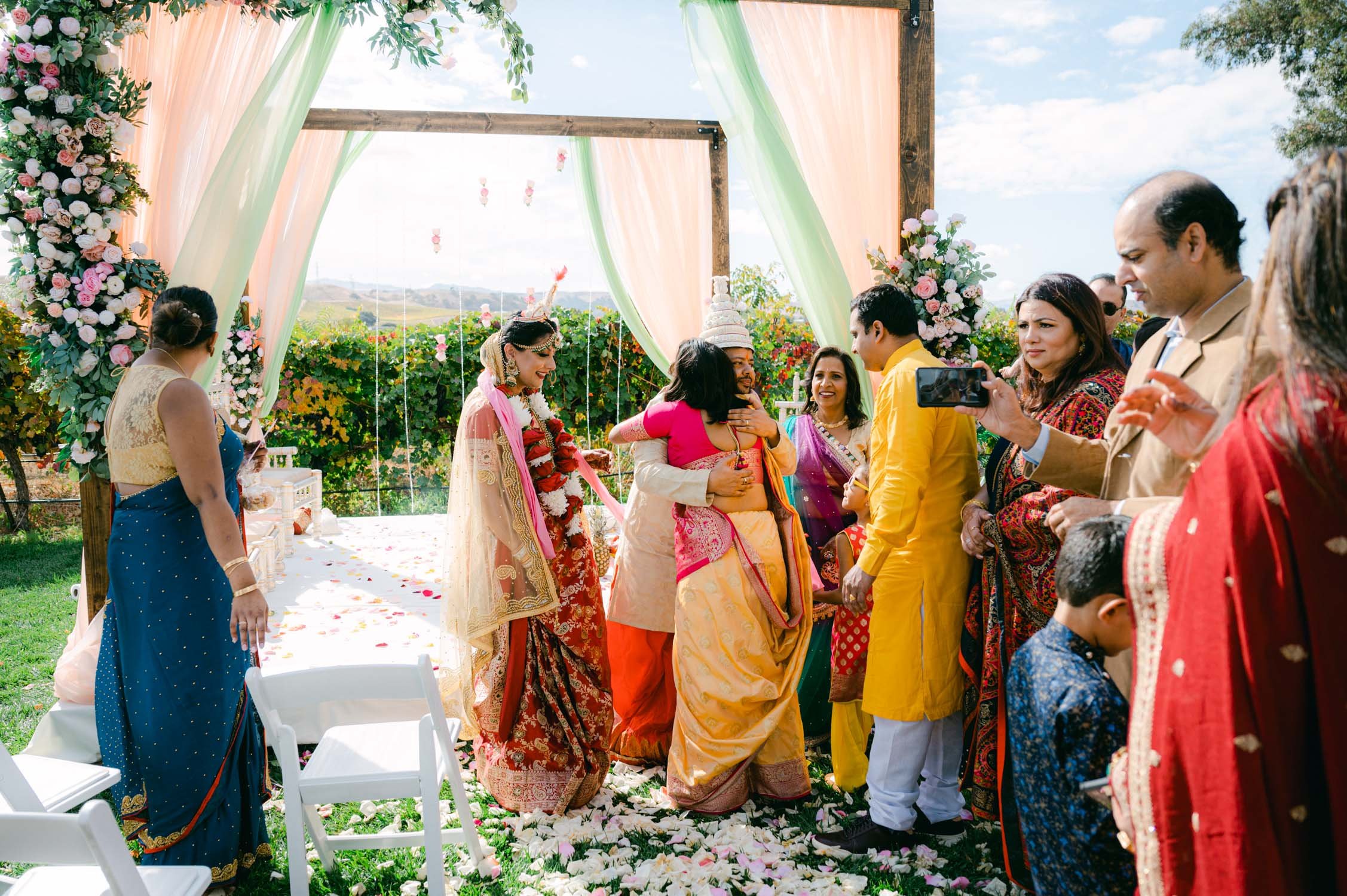 Hindu wedding ceremony at american canyon , photo of couple hugging guests