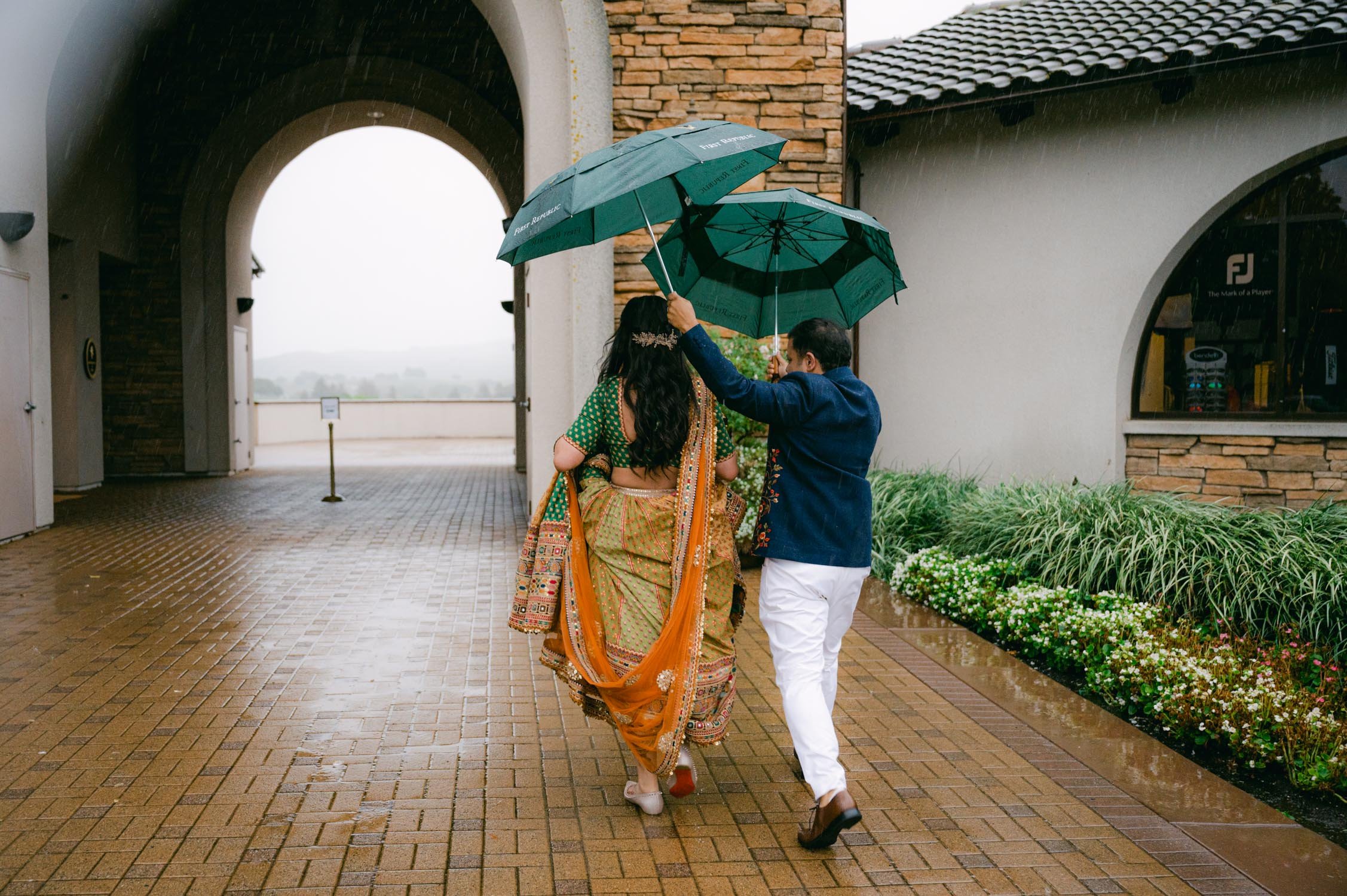 Hindu and Pakistani wedding, photo of couple during a rainy day