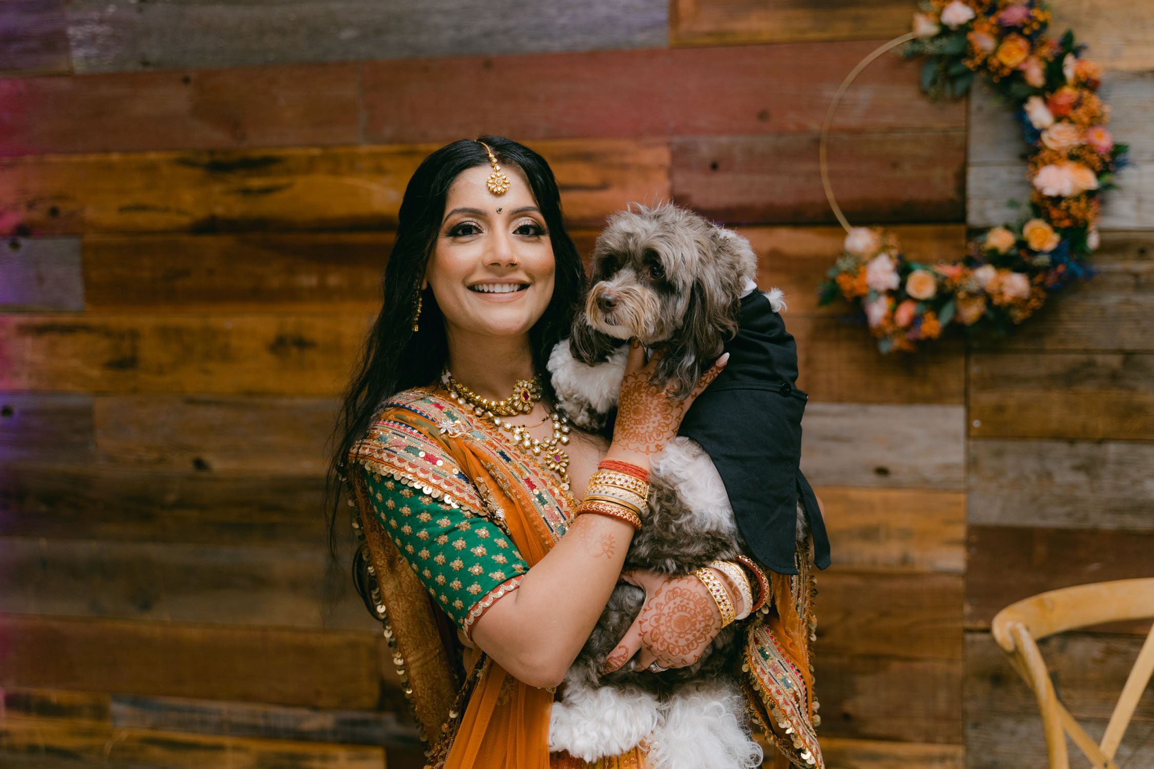 Indian wedding reception, photo of bride and her dog