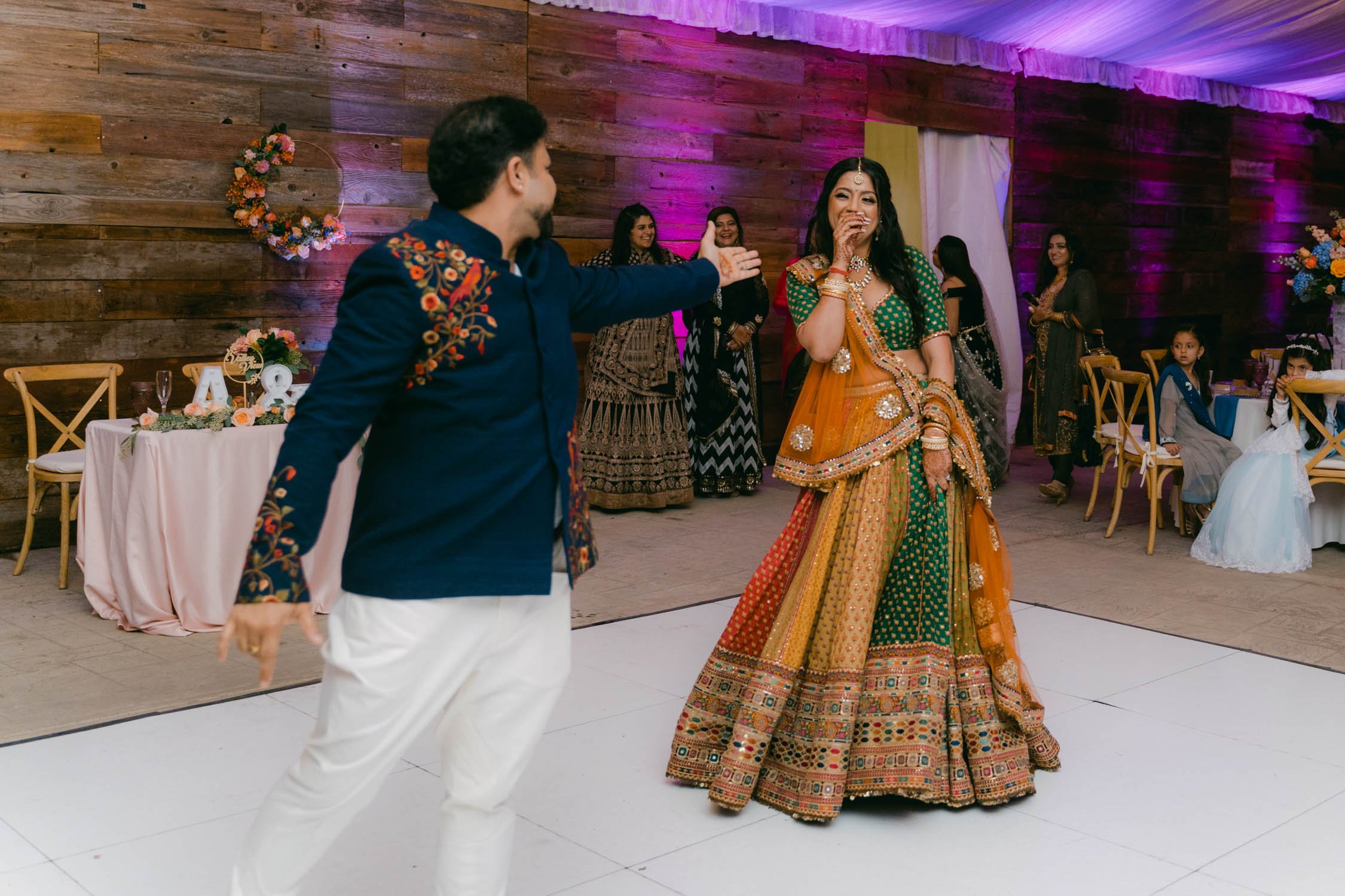 Indian wedding reception, photo of couple doing their first dance 