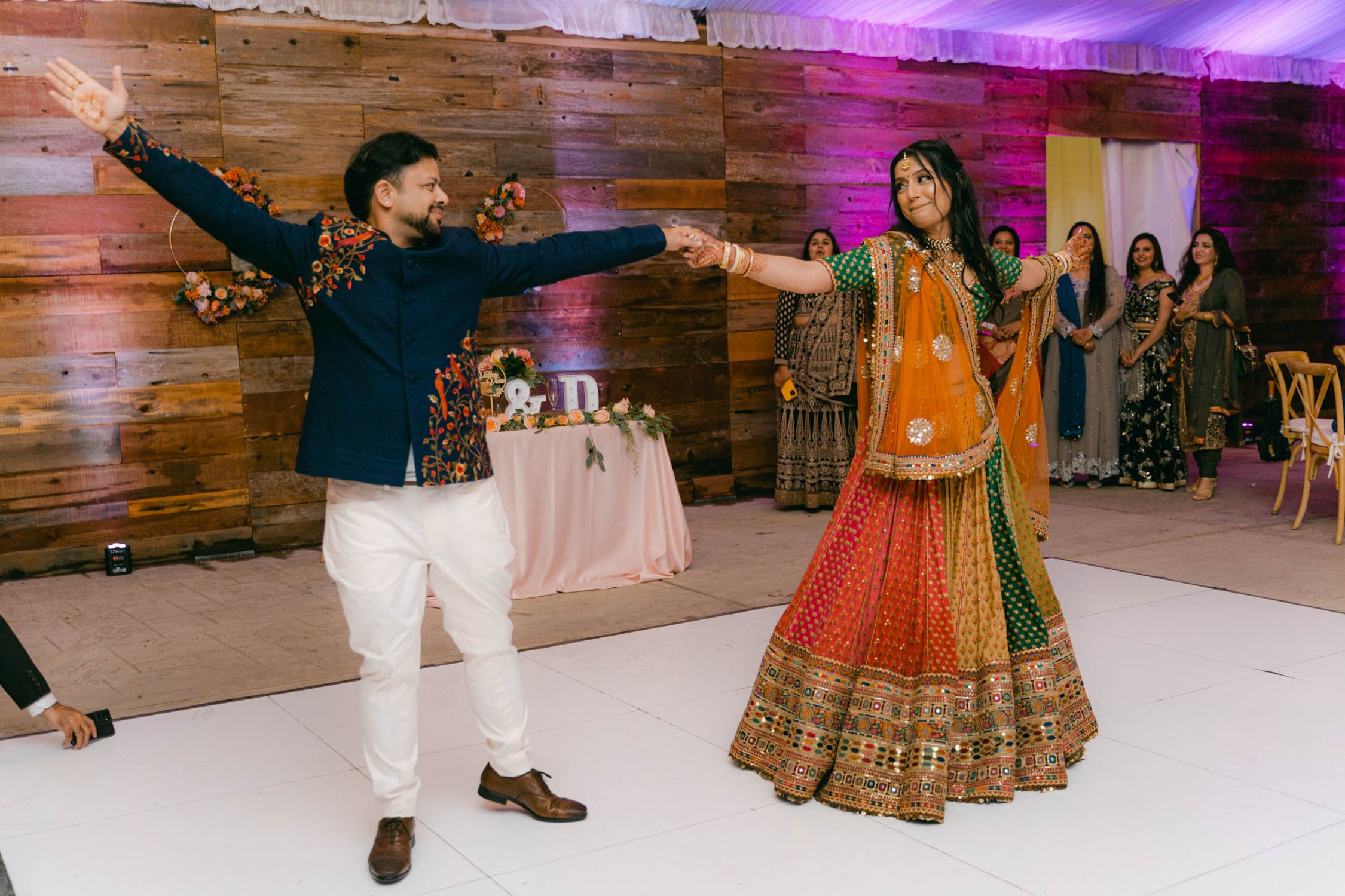 Indian wedding reception, photo of couple doing their first dance 