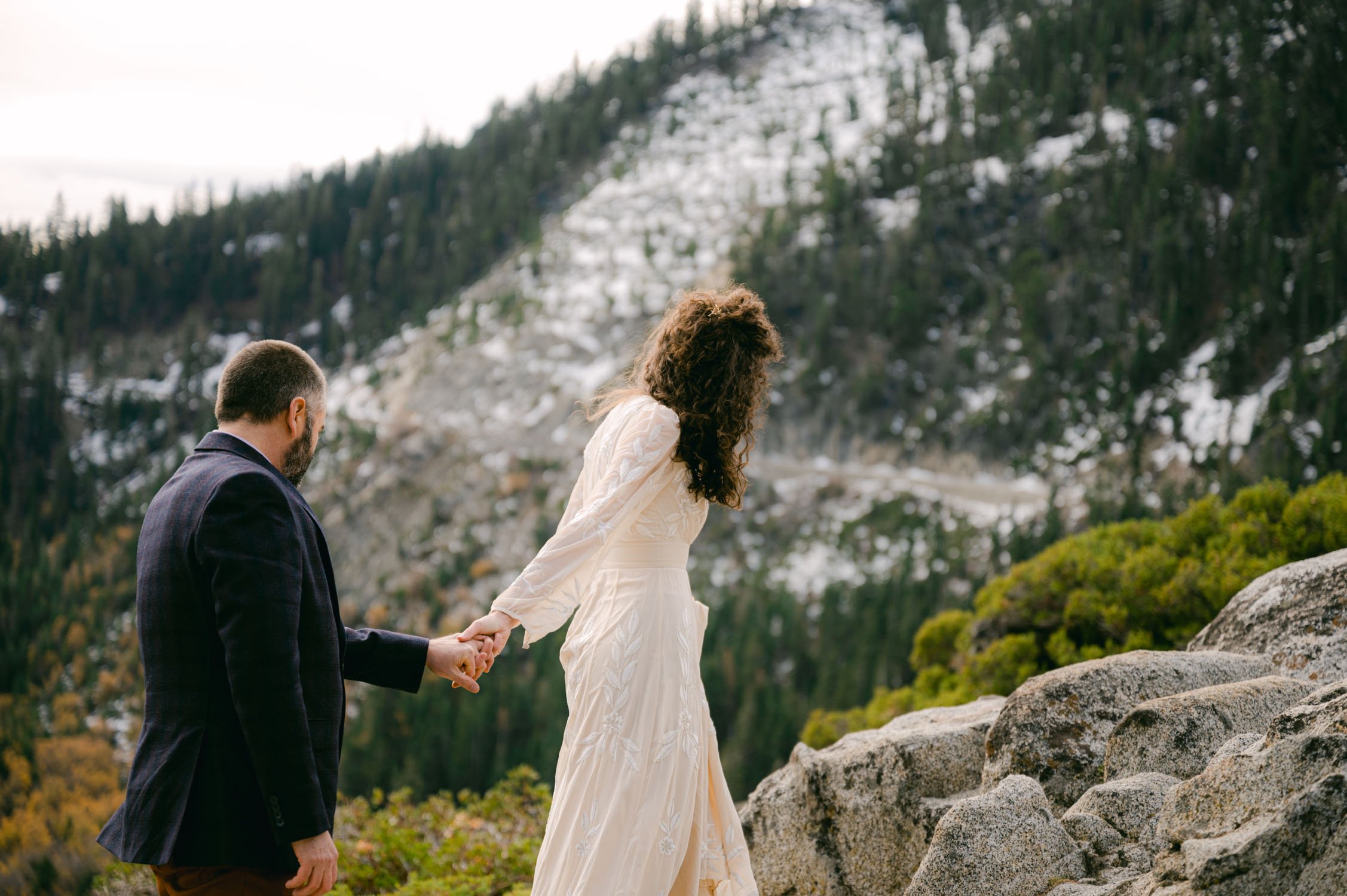 Emerald Bay Elopement Photographer, photo of the back of a long sleeve BHLDN dress 