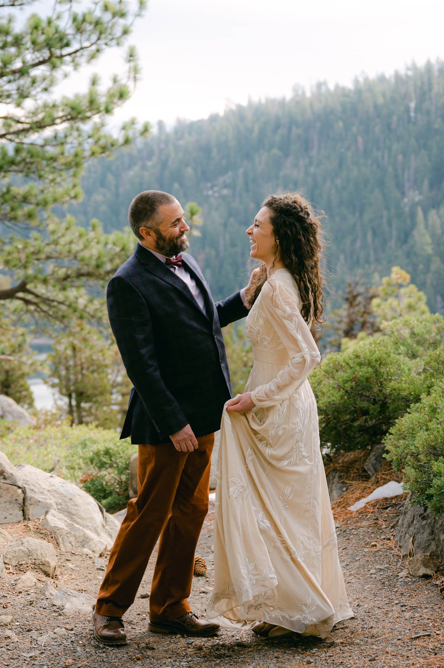 Emerald Bay Elopement, photo of couple on a private trail to an overlook