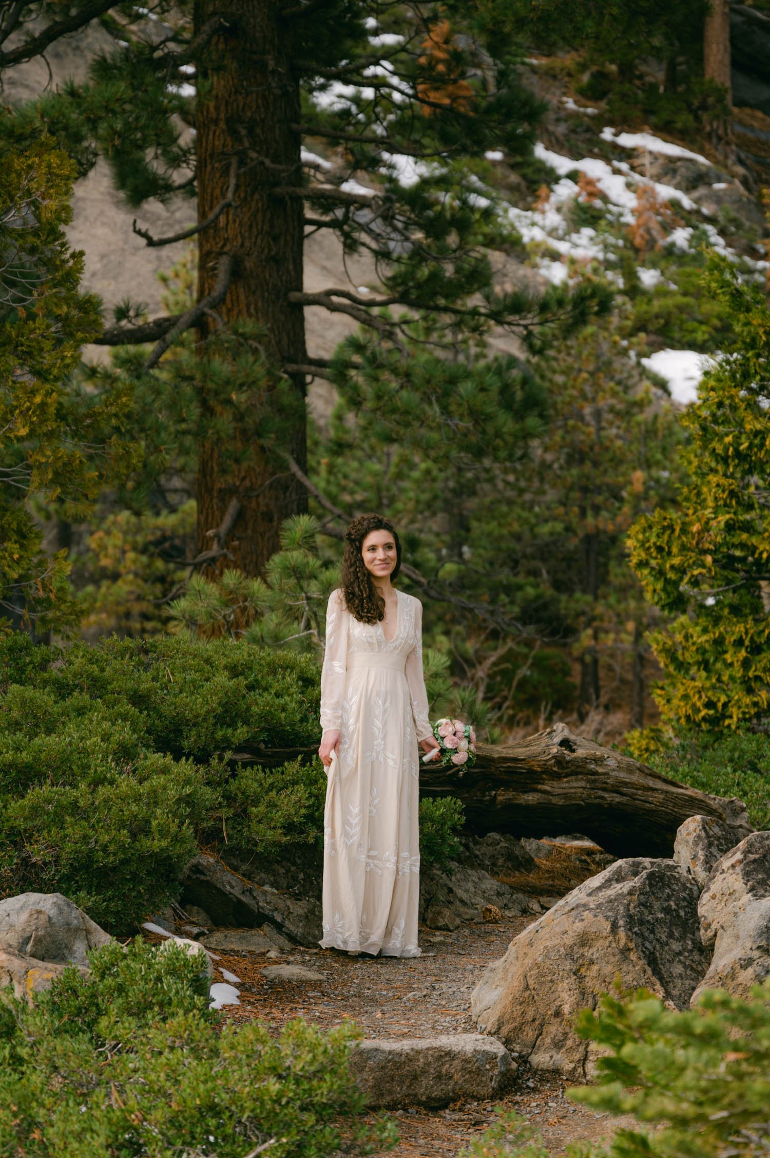 Emerald Bay Elopement, photo of a bride walking down the aisle by herself 