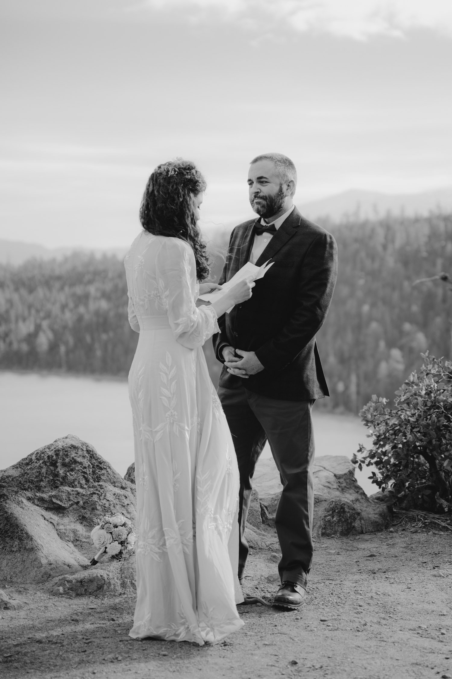 Emerald Bay Elopement, photo of bride reading her printed vows