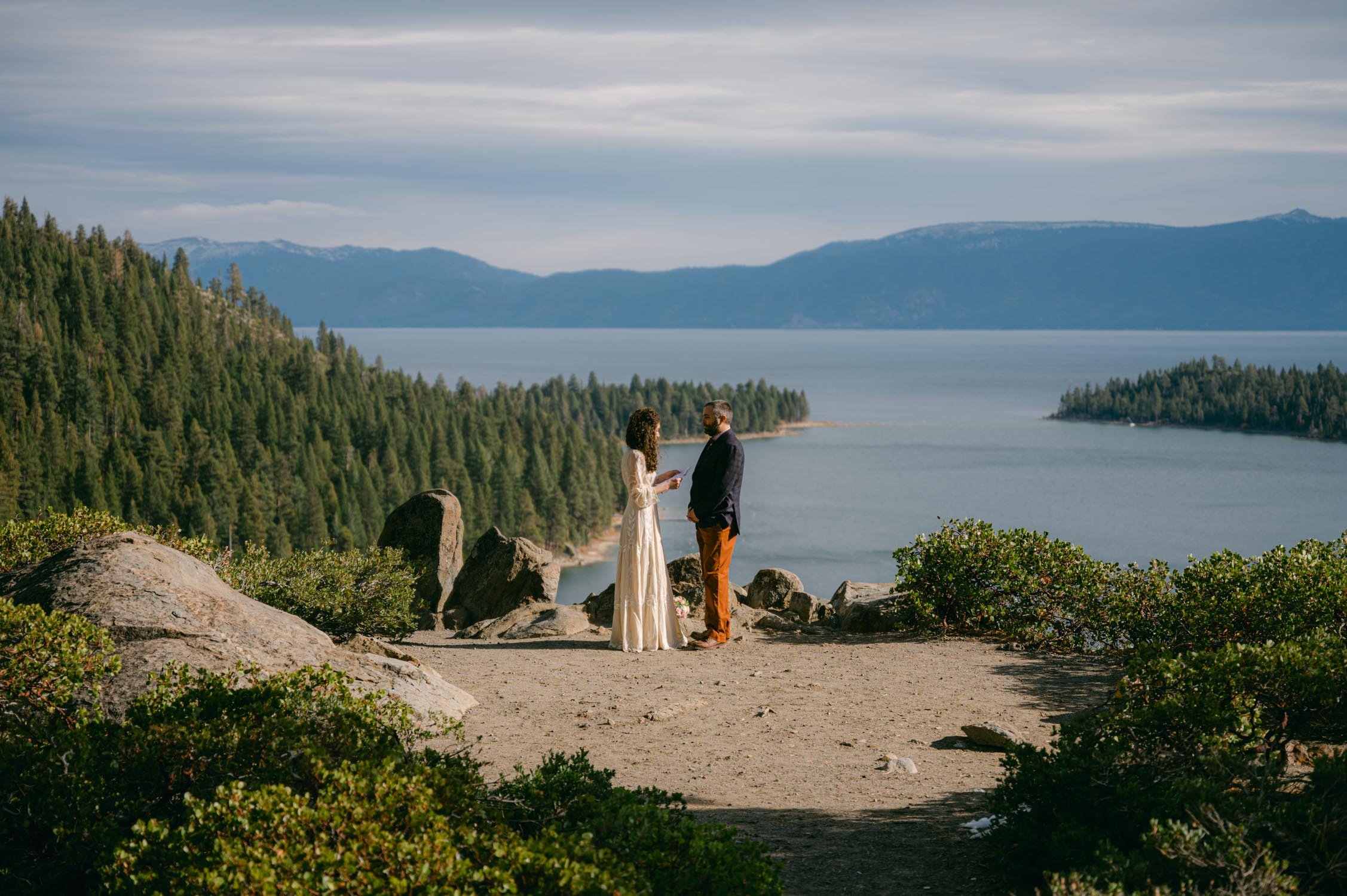 Emerald Bay Elopement, a wide-angle photo of couple at an overlook at Emerald Bay