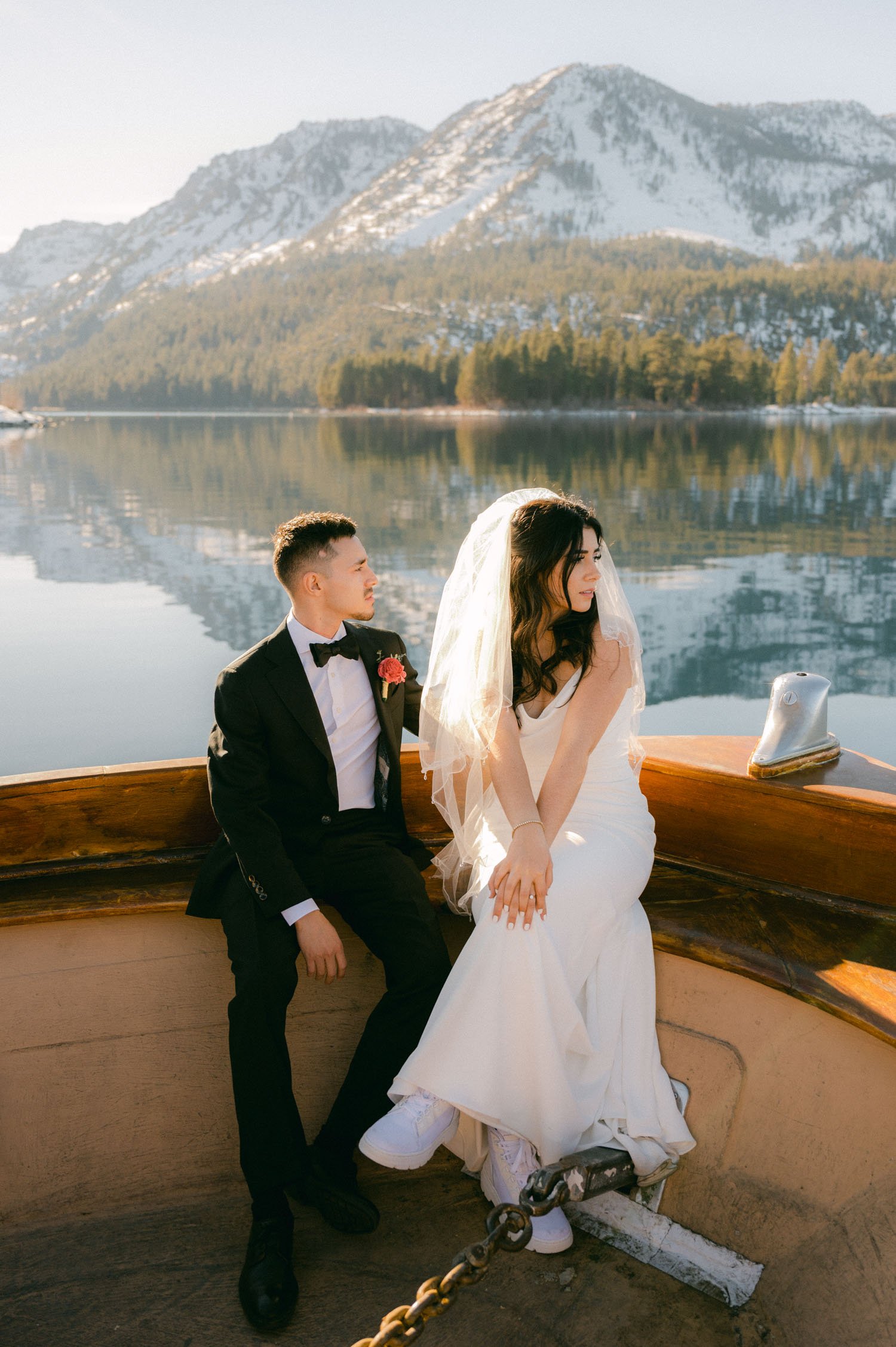 Tahoe Bleu Wave Wedding, photo of couple sitting on the boat during golden hour