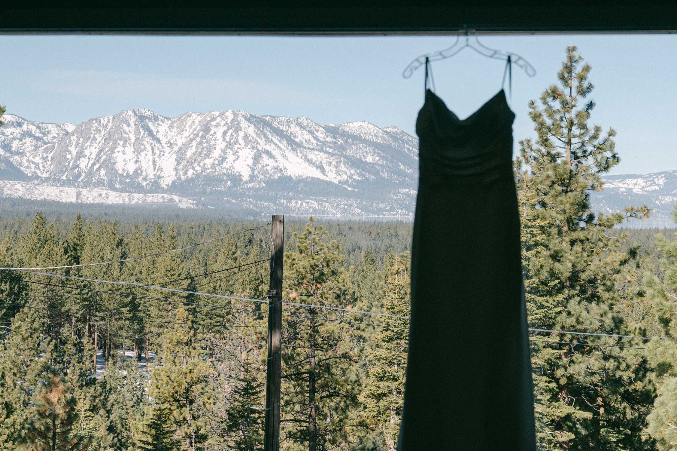 Tahoe Bleu Wave Wedding photo of a wedding dress with mountains in the background
