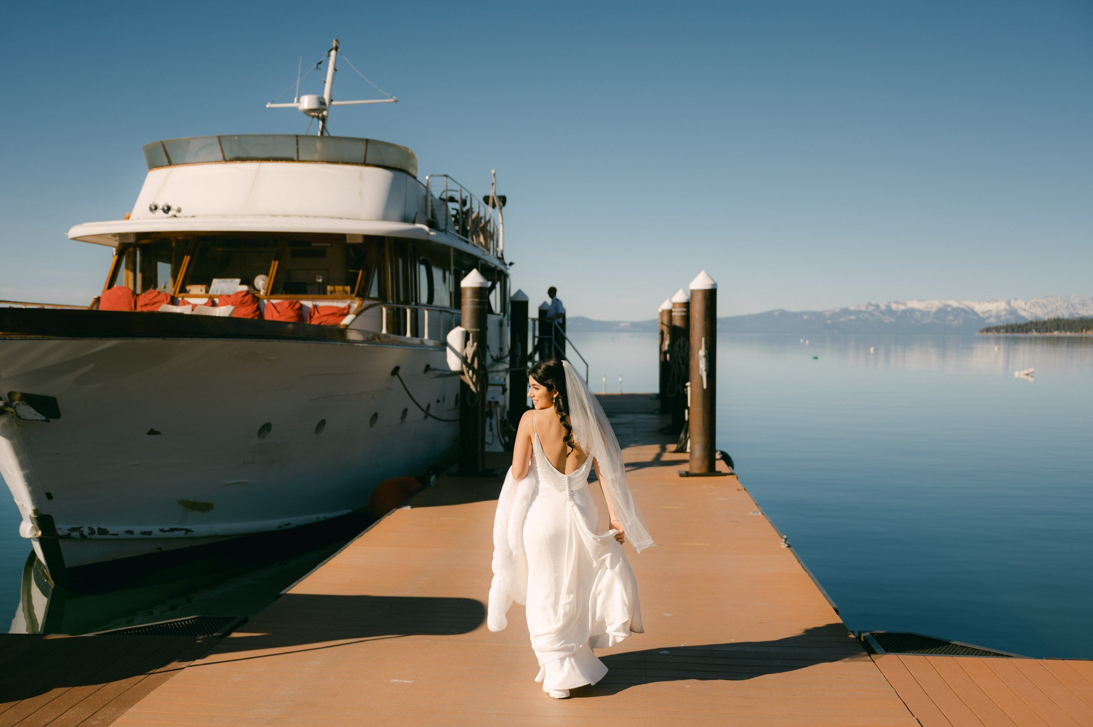 Tahoe Bleu Wave Wedding photo of bride next to the cruise boat