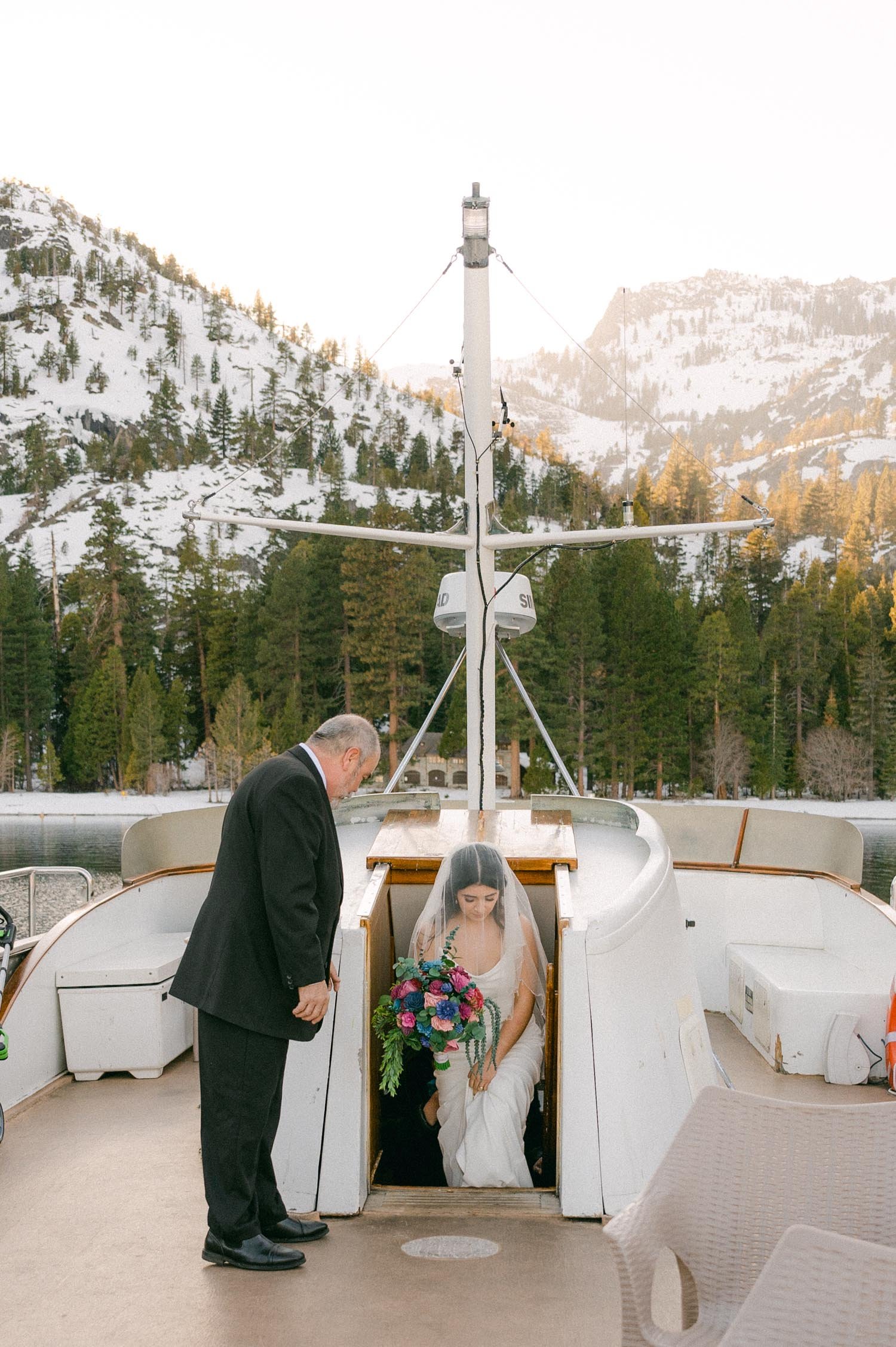 Tahoe Bleu Wave Wedding photo of bride with a veil over her face 