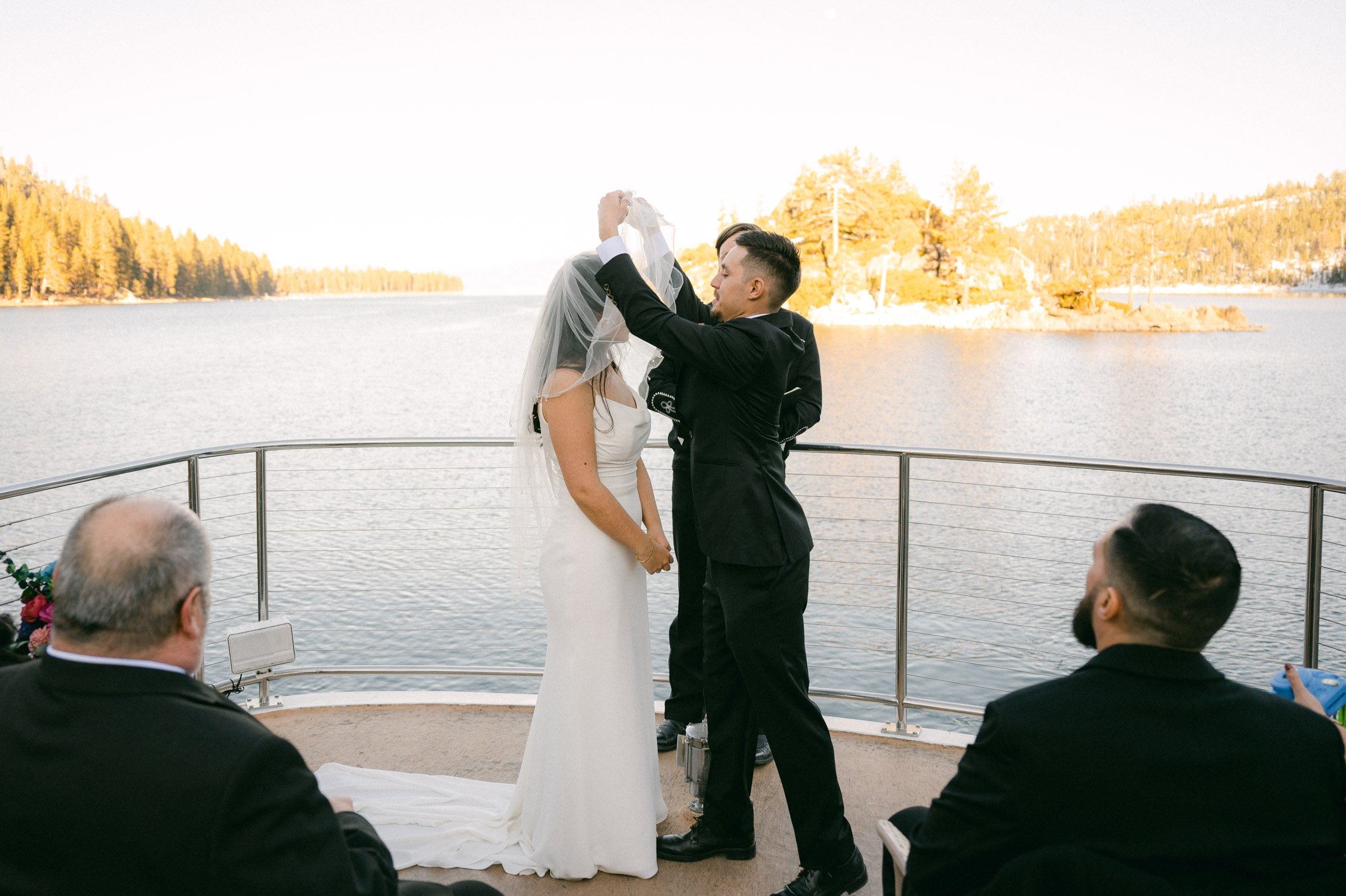 Tahoe Bleu Wave Wedding photo of groom removing the veil