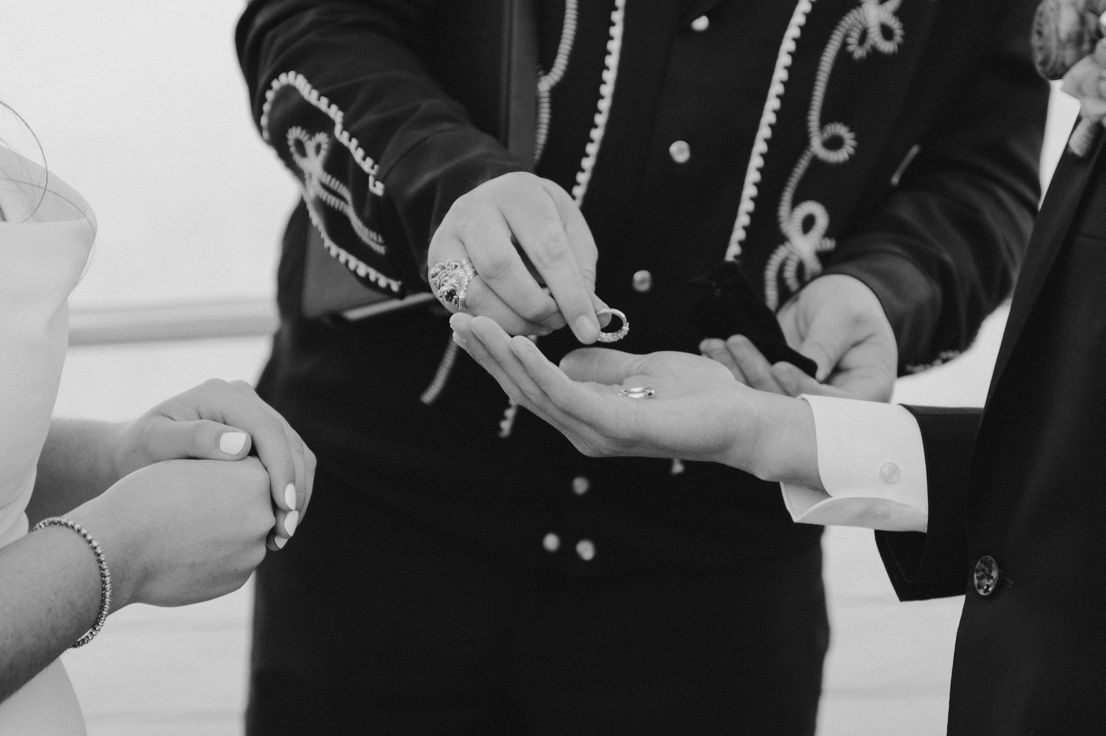 Tahoe Bleu Wave Wedding photo of rings being exchanged 