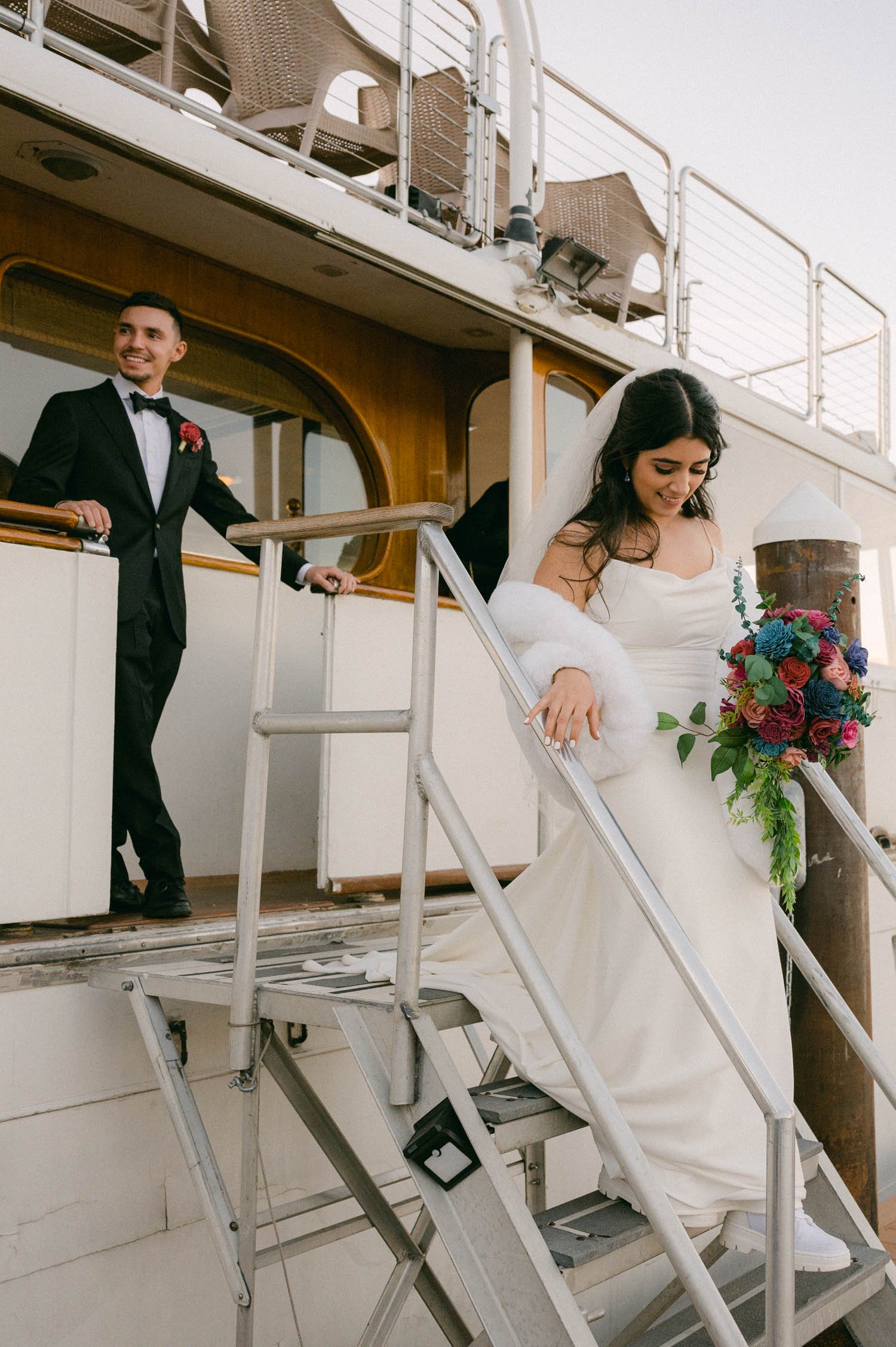 Tahoe Bleu Wave Wedding photo of couple walking off the boat