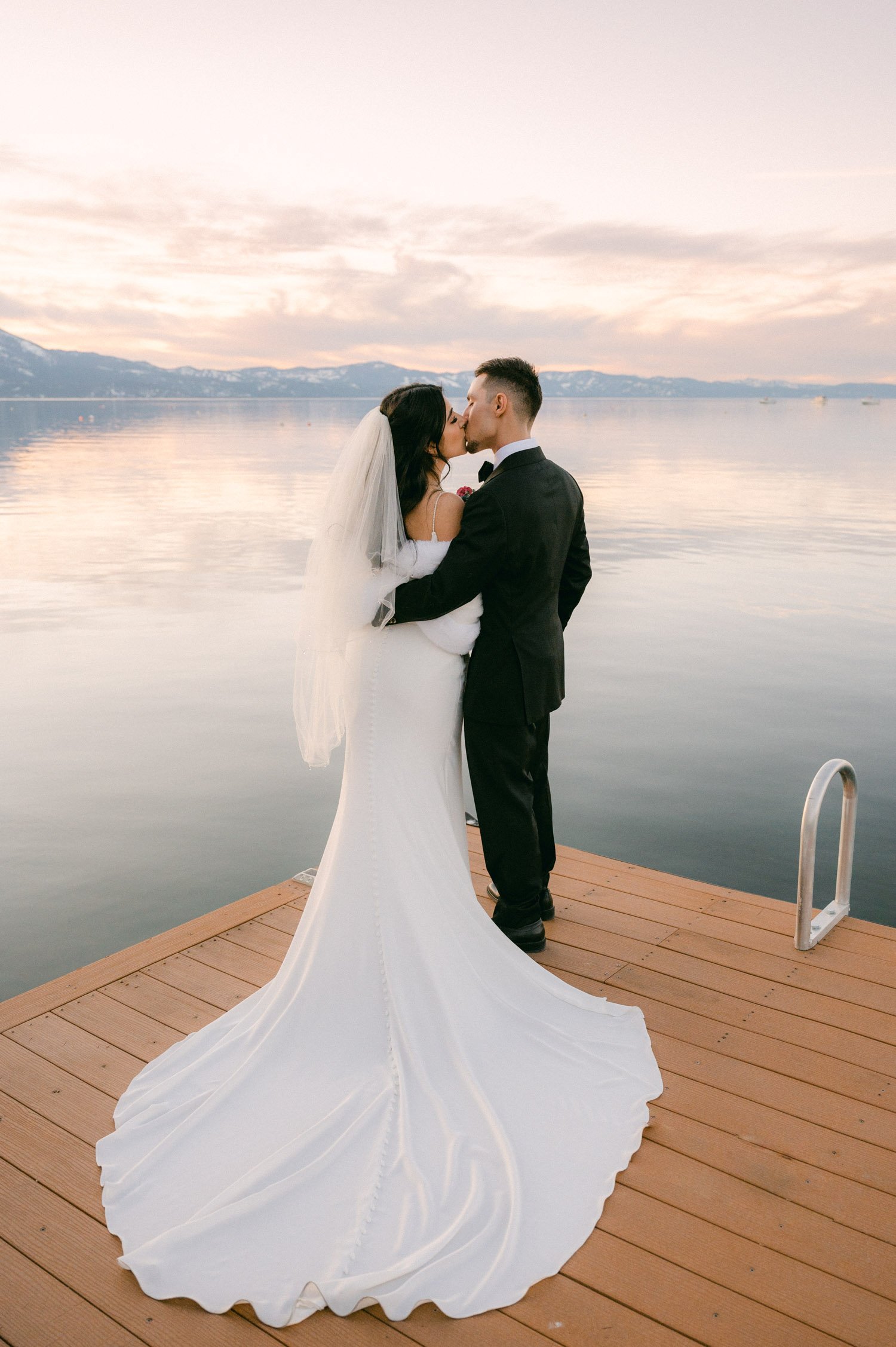 Tahoe Bleu Wave Wedding photo of couple at a dock during sunset