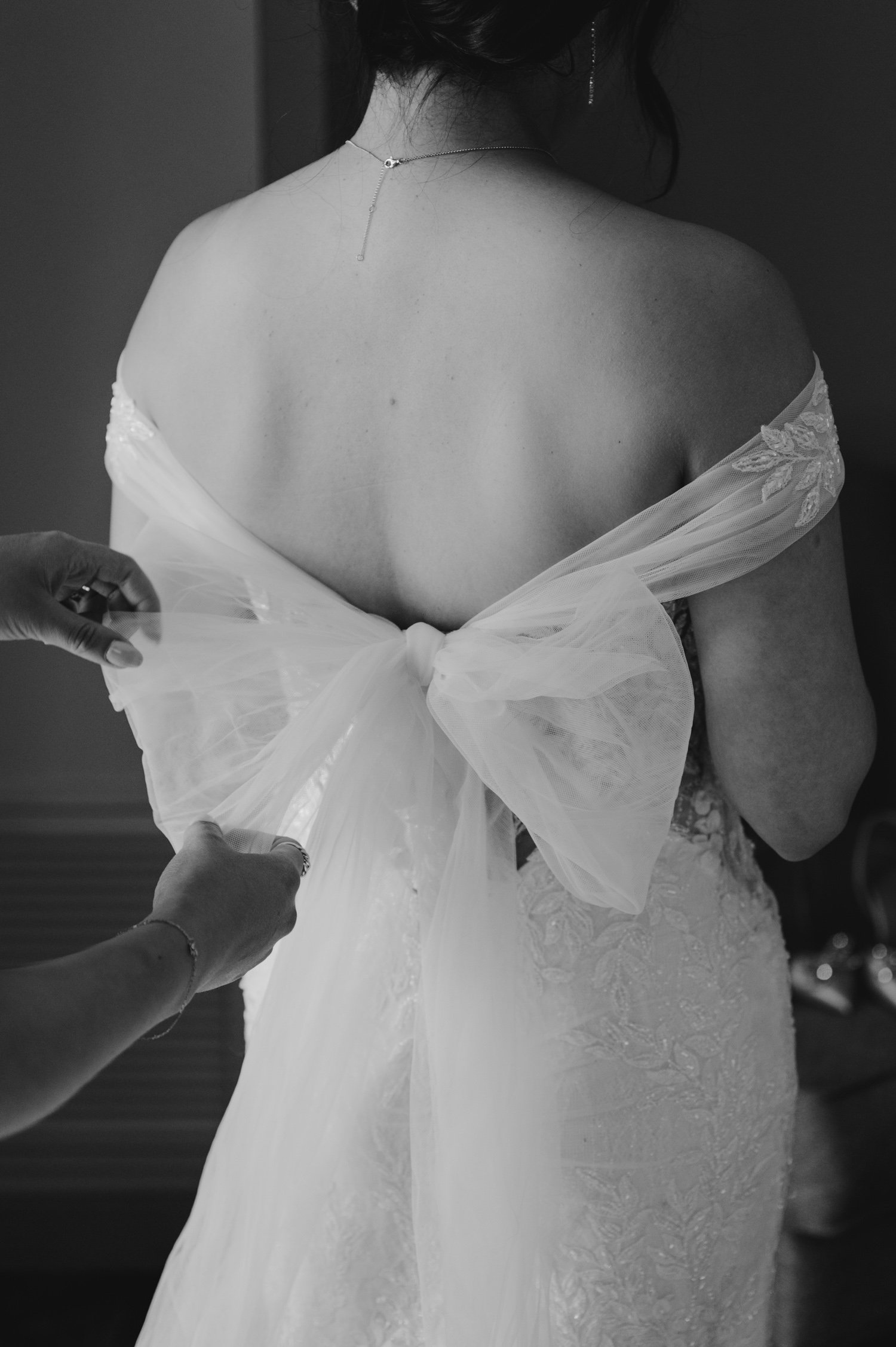 Edgewood Tahoe wedding photos, photo of  the back of a wedding dress with a delicate bow