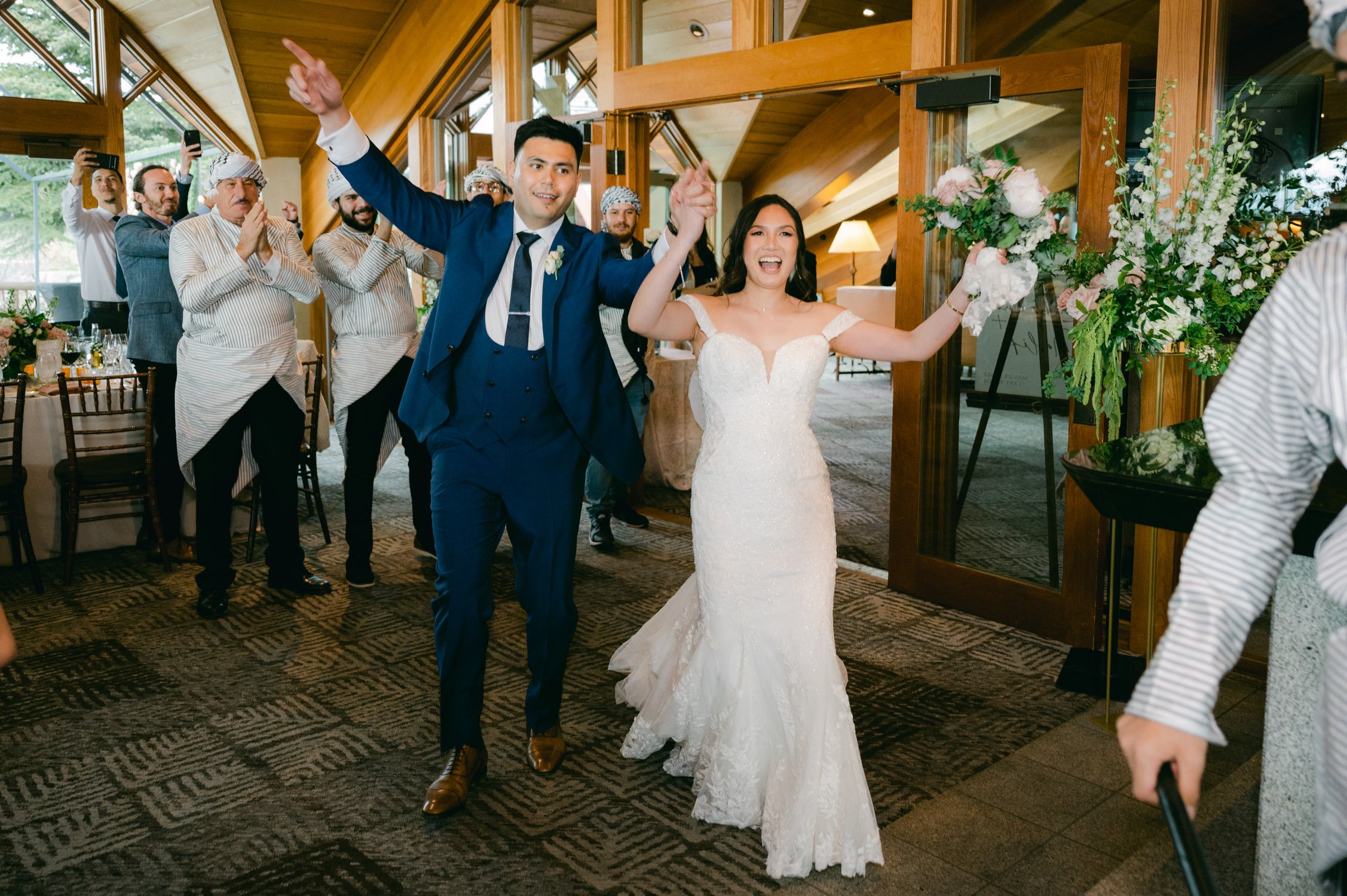 Edgewood Tahoe Wedding photos: photo of couple at their grand entrance with the drummers