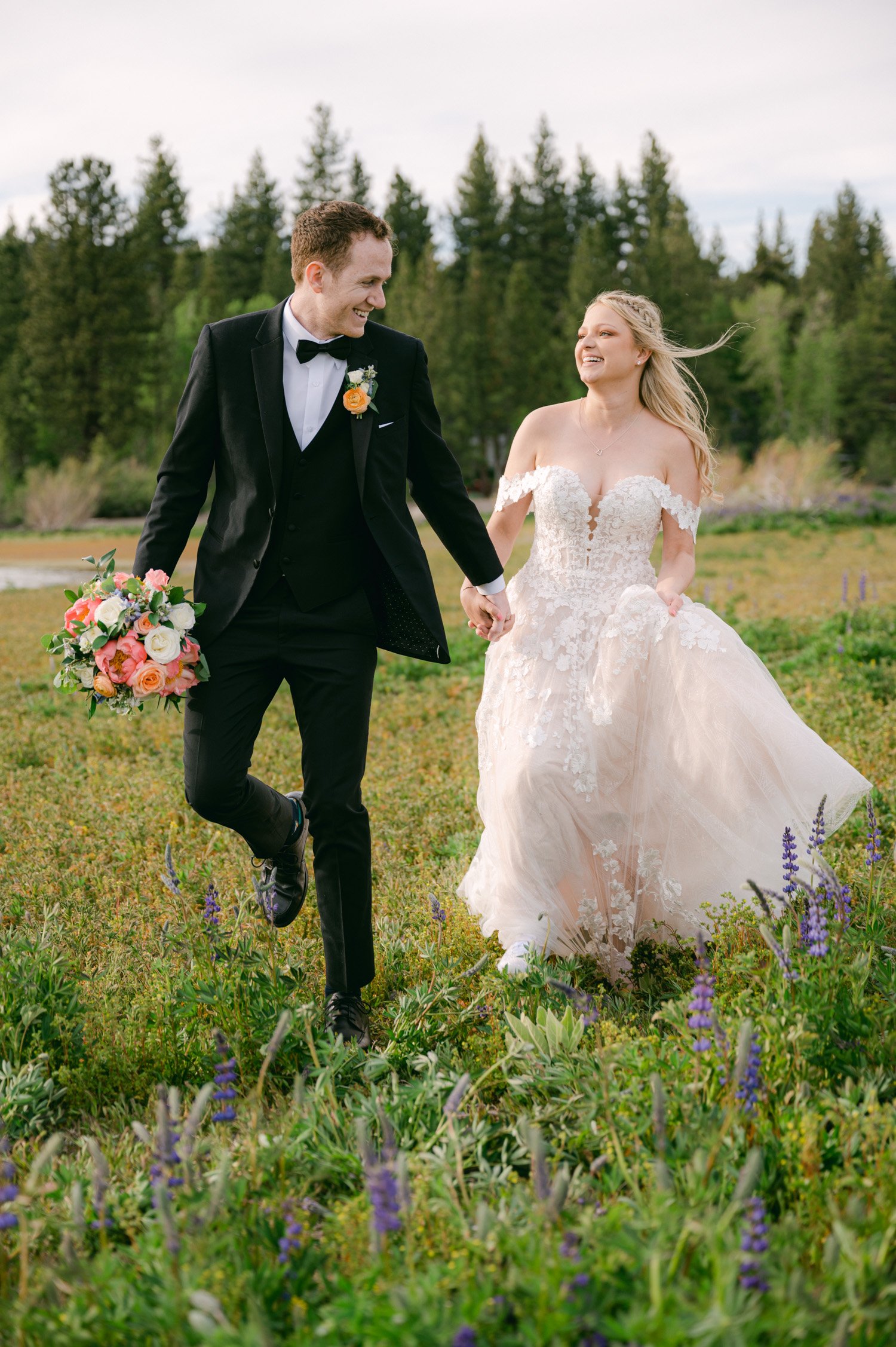 Lake Tahoe elopement, photo of couple walking on a meadow by the lake